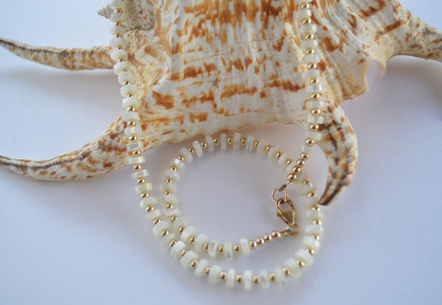 Luminous and Iridescent Mother of Pearl Heishi Necklace with 18K Gold Filled Beads and Lobster Clasp. 18", 6mm Round Shells