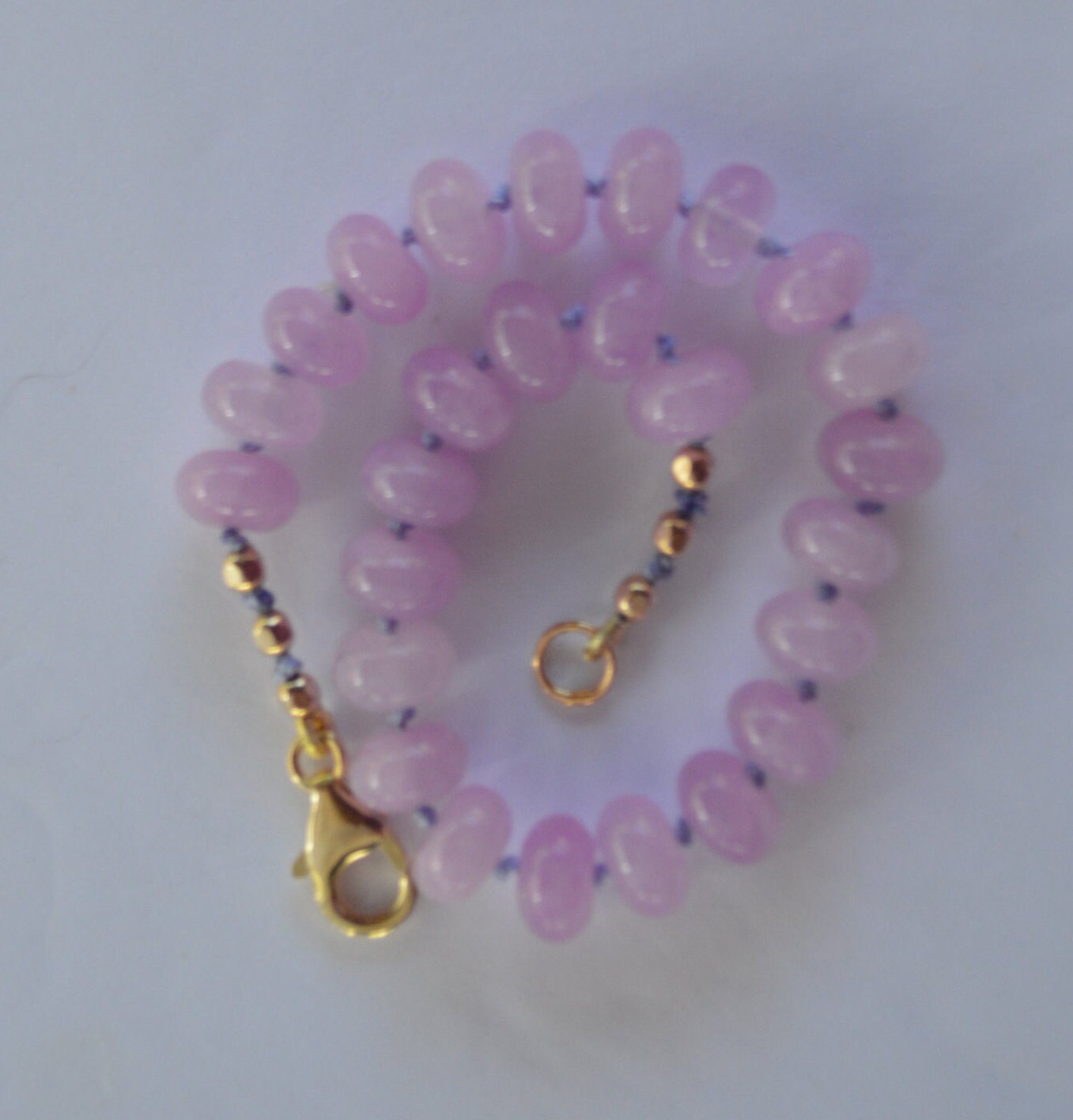 Lavender Quartz Rondelle Bracelet Hand Knotted on Lavender Silk. 7- 3/4". Gold Filled Lobster Claw Clasp and Faceted Beads