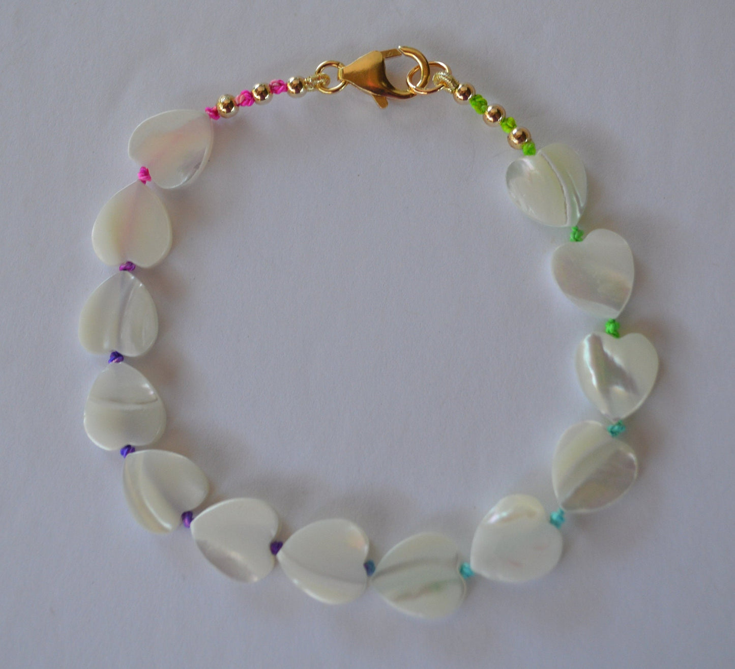 Beautiful Mother of Pearl Heart Bead Bracelet Hand Knotted on Multicolored Silk Thread. Gold Filled Lobster Claw and Beads. 8 or 10 mm.