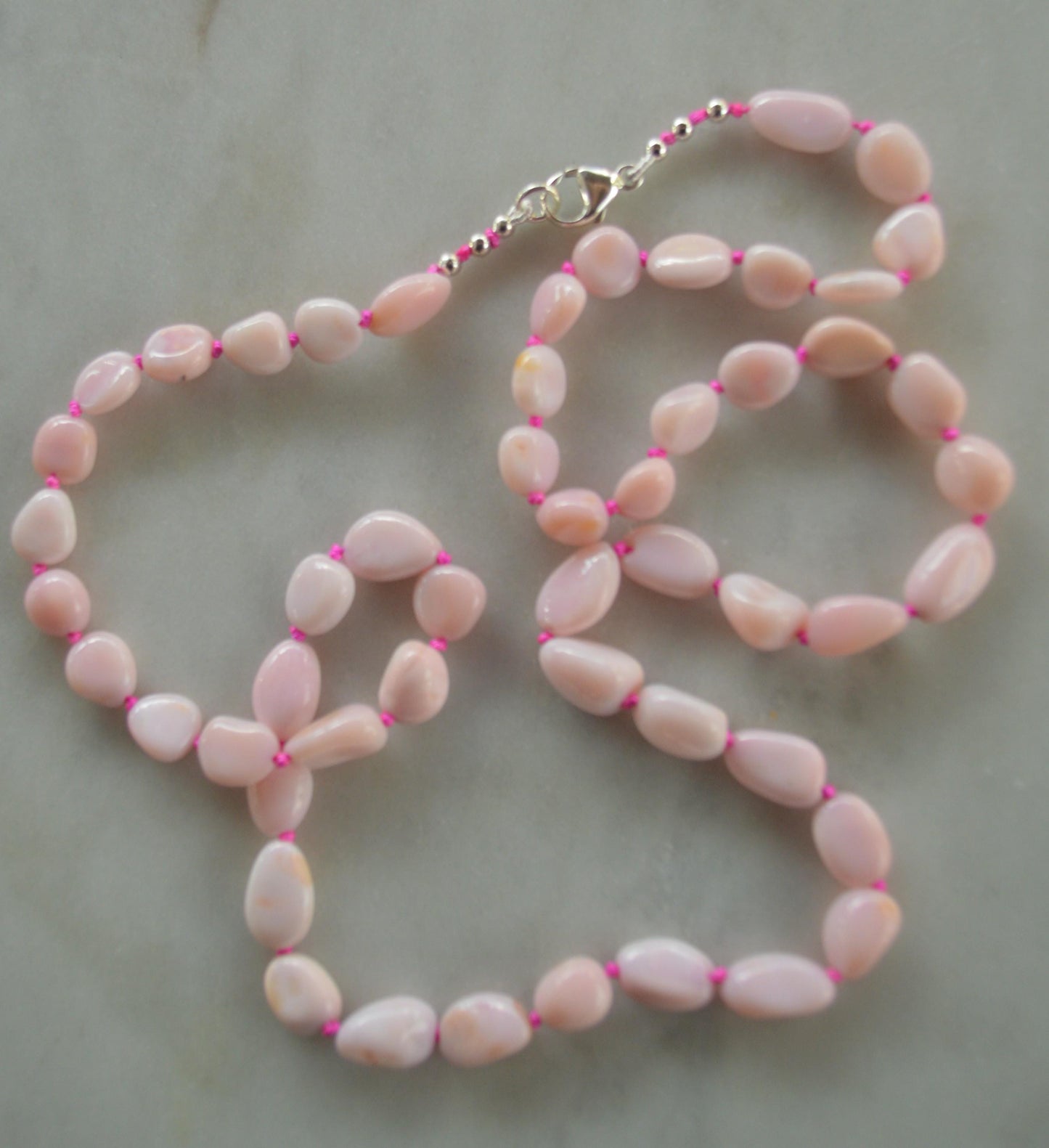Pink Opal Smooth Nuggets Hand Knotted on Custom Fuchsia Silk and Finished with a Sterling Silver Lobster Clasp