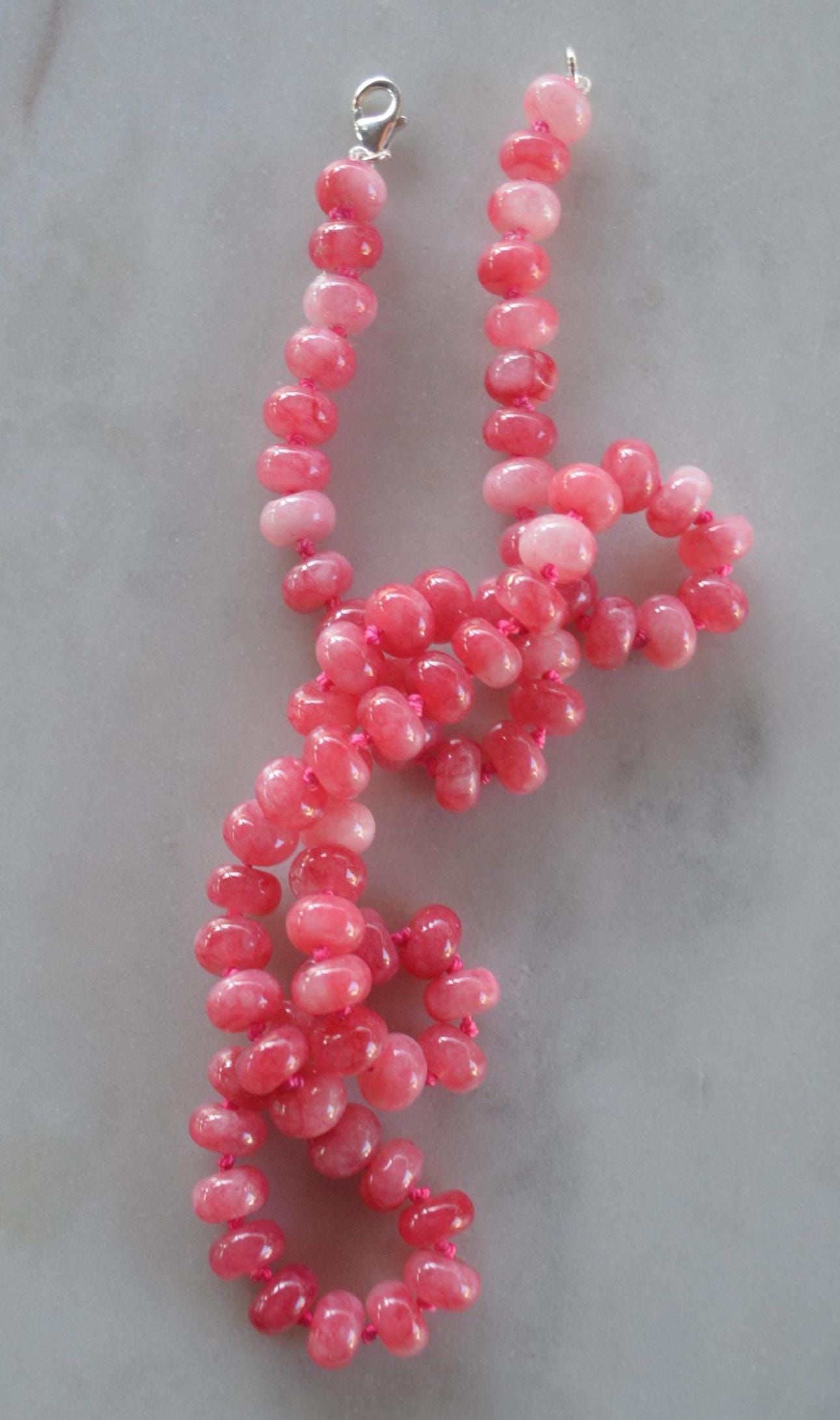 Grapefruit Quartz Smooth Rondelle Gemstones Hand Knotted on Custom Grapefruit Colored Silk. Sterling Lobster Clasp