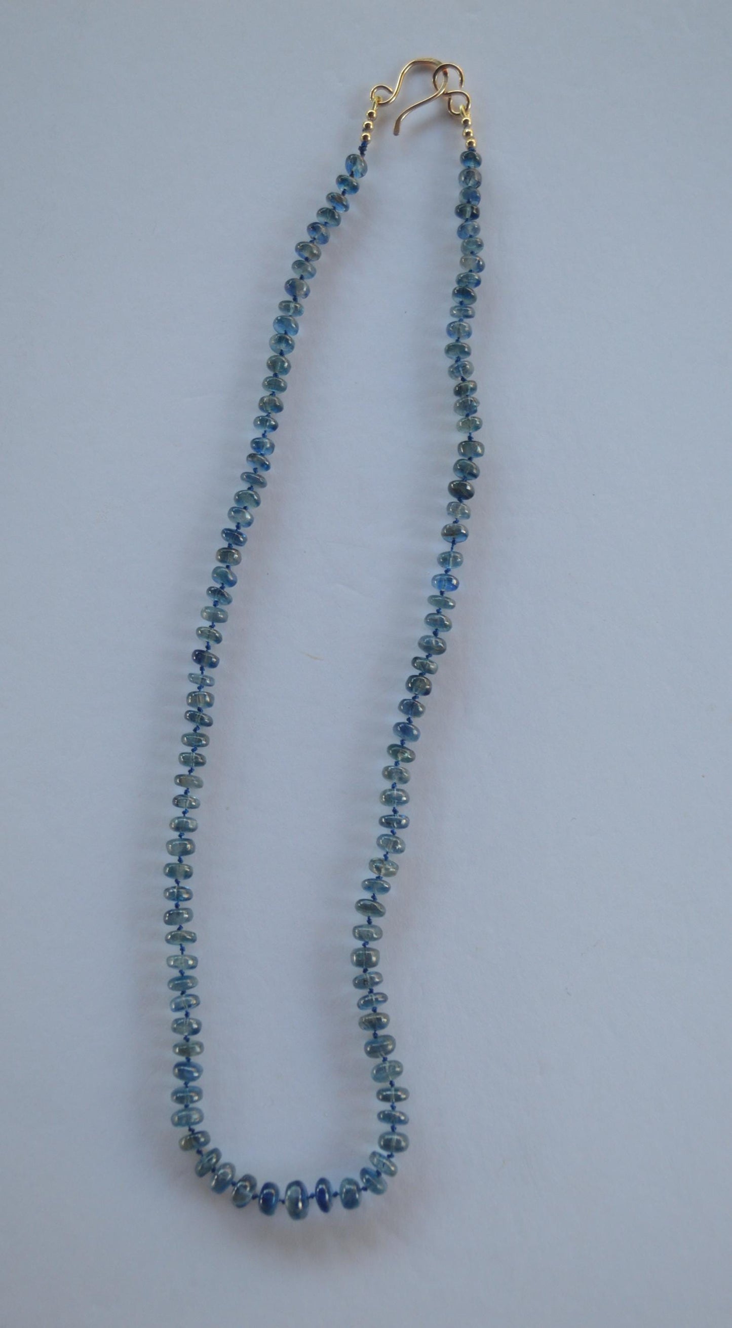 Moss Aquamarine Smooth Rondelle Gemstone Necklace Hand Knotted on Dark Blue Silk. 27.5"