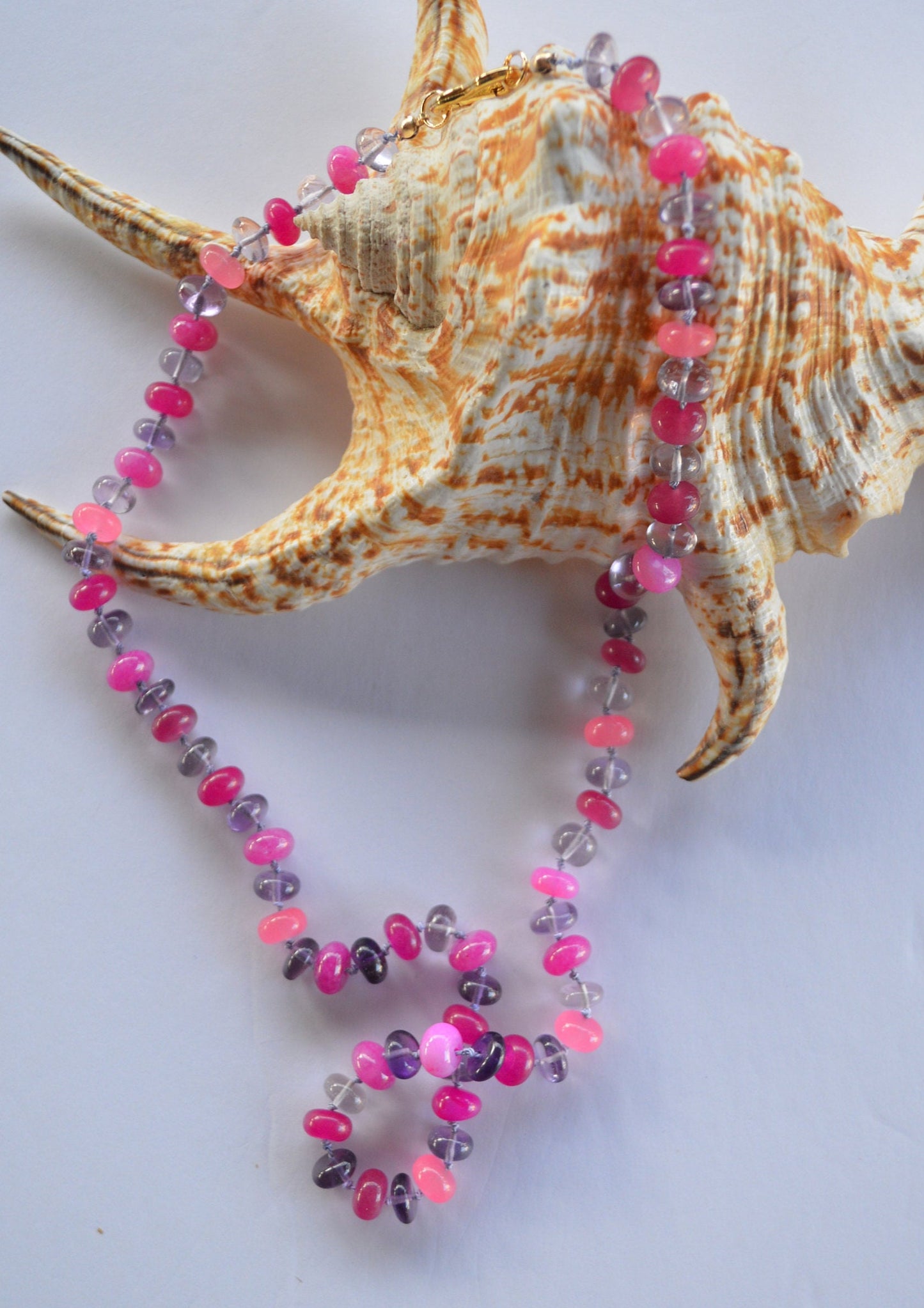 Pink and Purple Hand Knotted Necklace. Amethyst and 4 Colors of Pink Chalcedony and Quartz Gemstones on Lilac Silk.  Gold Filled Heart Clasp