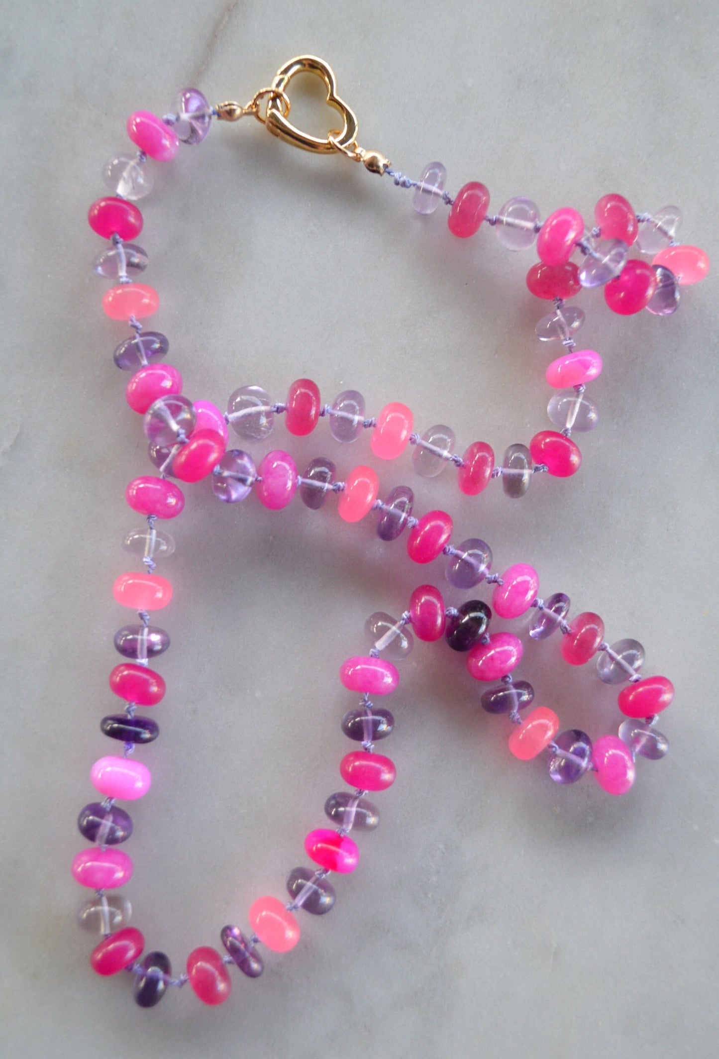 Pink and Purple Hand Knotted Necklace. Amethyst and 4 Colors of Pink Chalcedony and Quartz Gemstones on Lilac Silk.  Gold Filled Heart Clasp