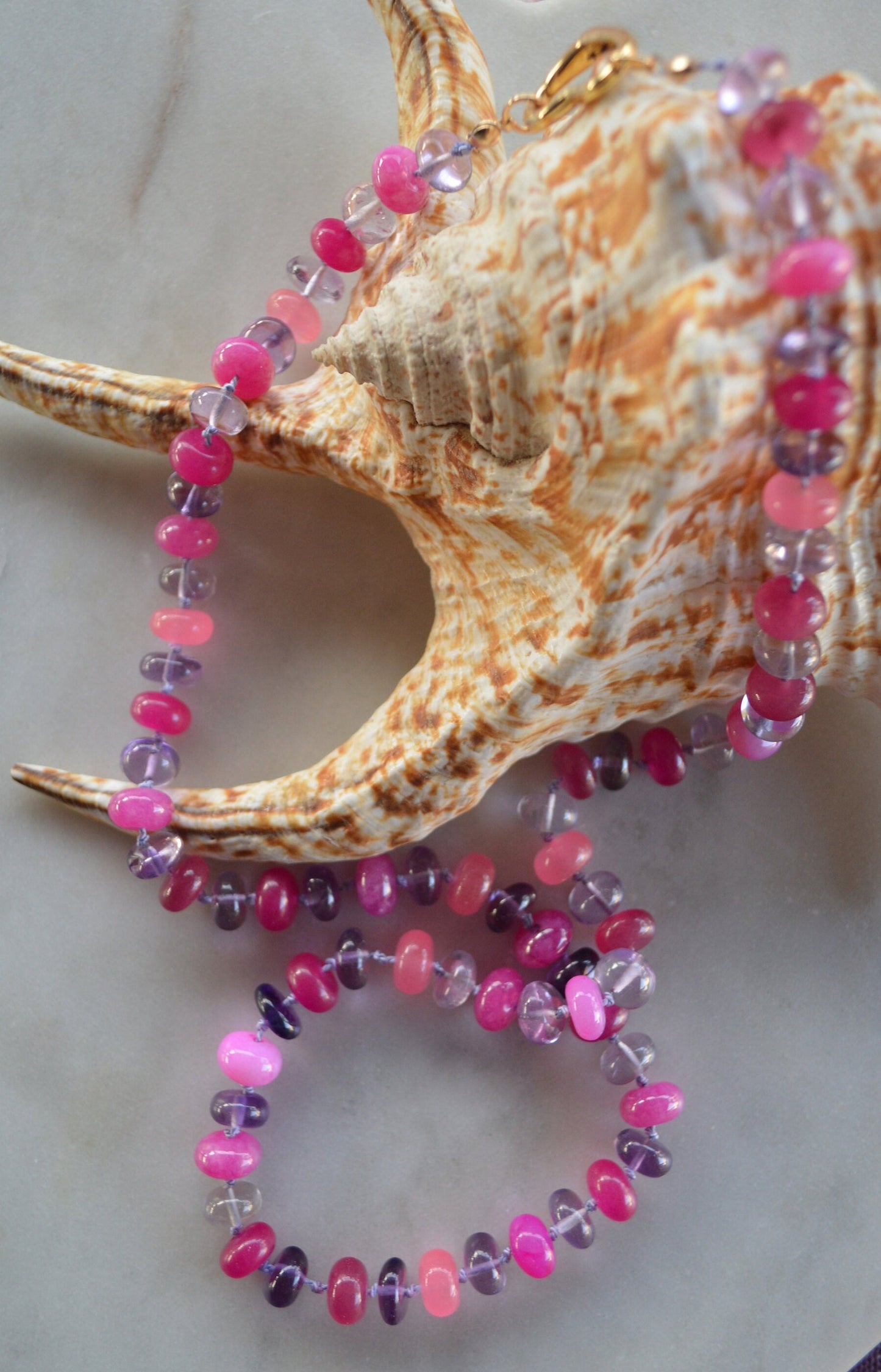 Pink and Purple Hand Knotted Necklace. Amethyst and 4 Colors of Pink Chalcedony and Quartz Gemstones on Lilac Silk.  Gold Filled Heart Clasp