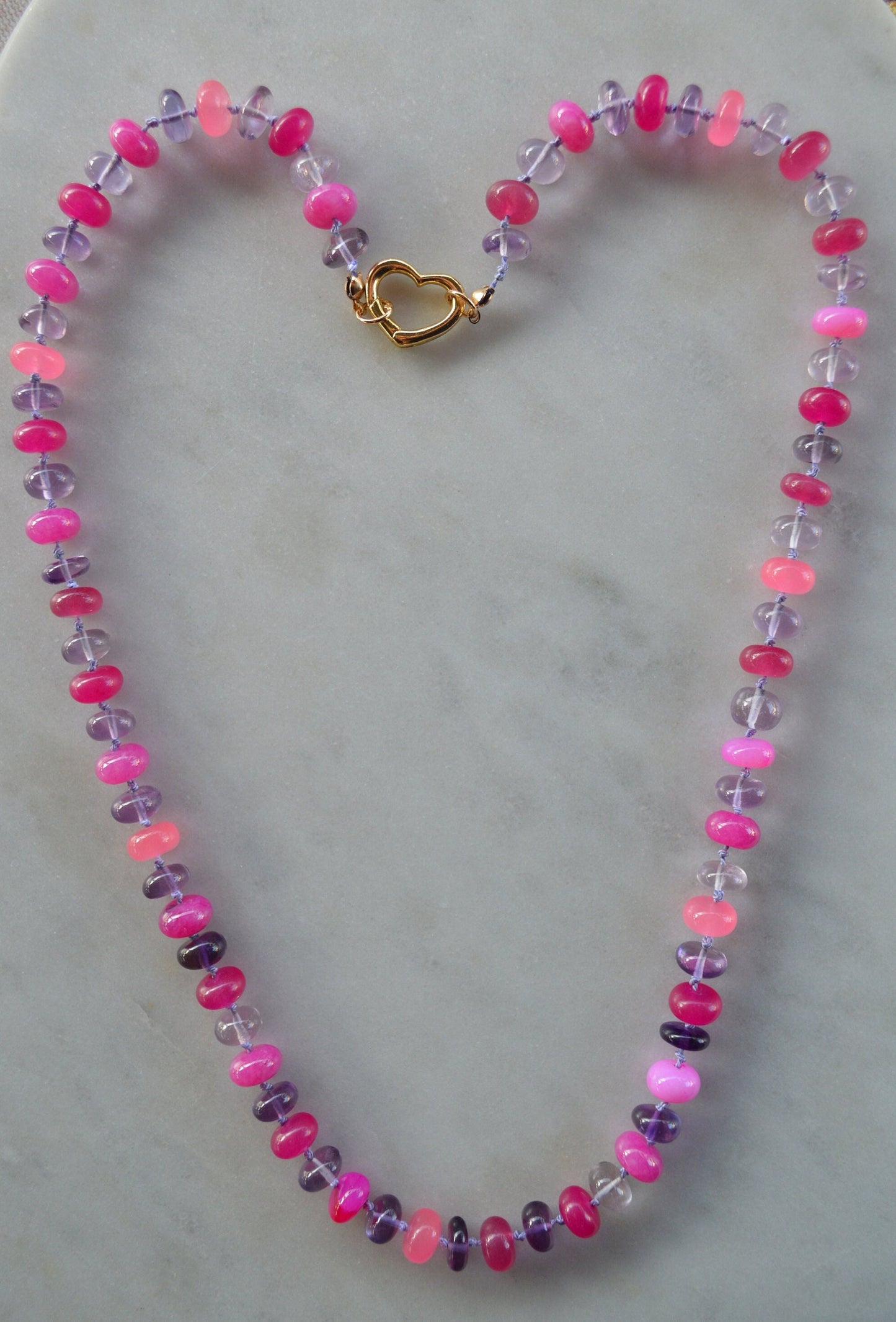 Pink and Purple Hand Knotted Necklace. Amethyst and 4 Colors of Pink Chalcedony and Quartz Gemstones on Lilac Silk.  Gold Filled Heart Clasp