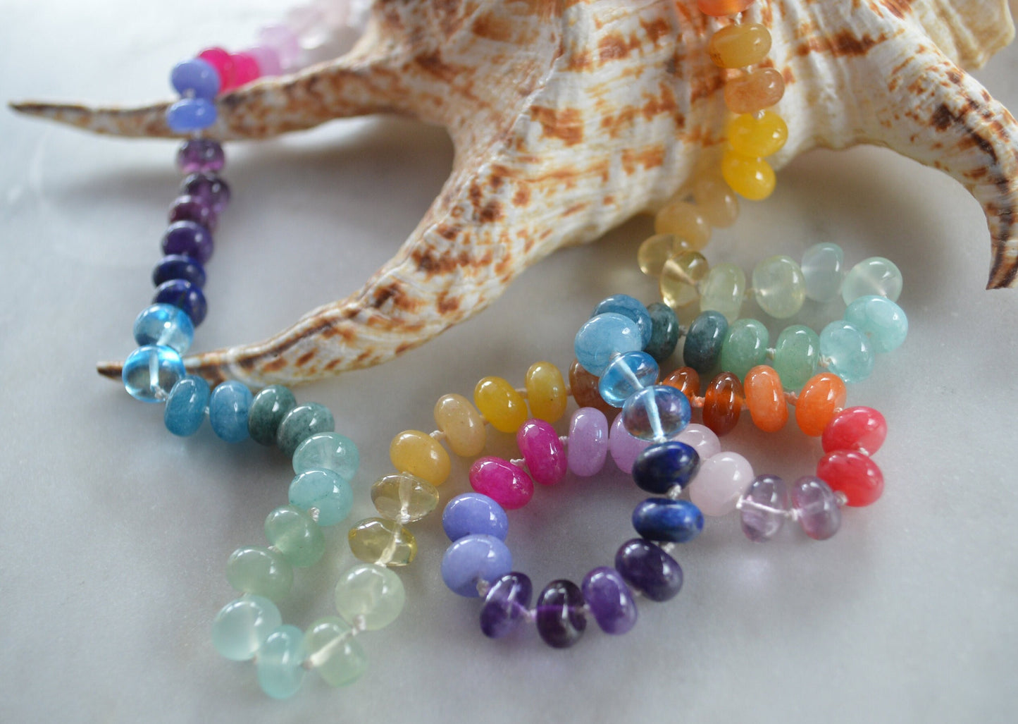 Rainbow Gemstone (8mm) Necklace Hand Knotted on White Silk. 18K Hand Forged Gold Filled Clasp. 12 Types of Gemstones. Made to Order