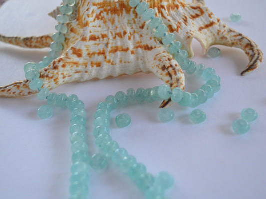 Aqua Blue Chalcedony Smooth Rondelle Natural AAA Gemstones Hand knotted on Turquoise Silk. Sterling Silver Hook and Eye Clasp. 20"