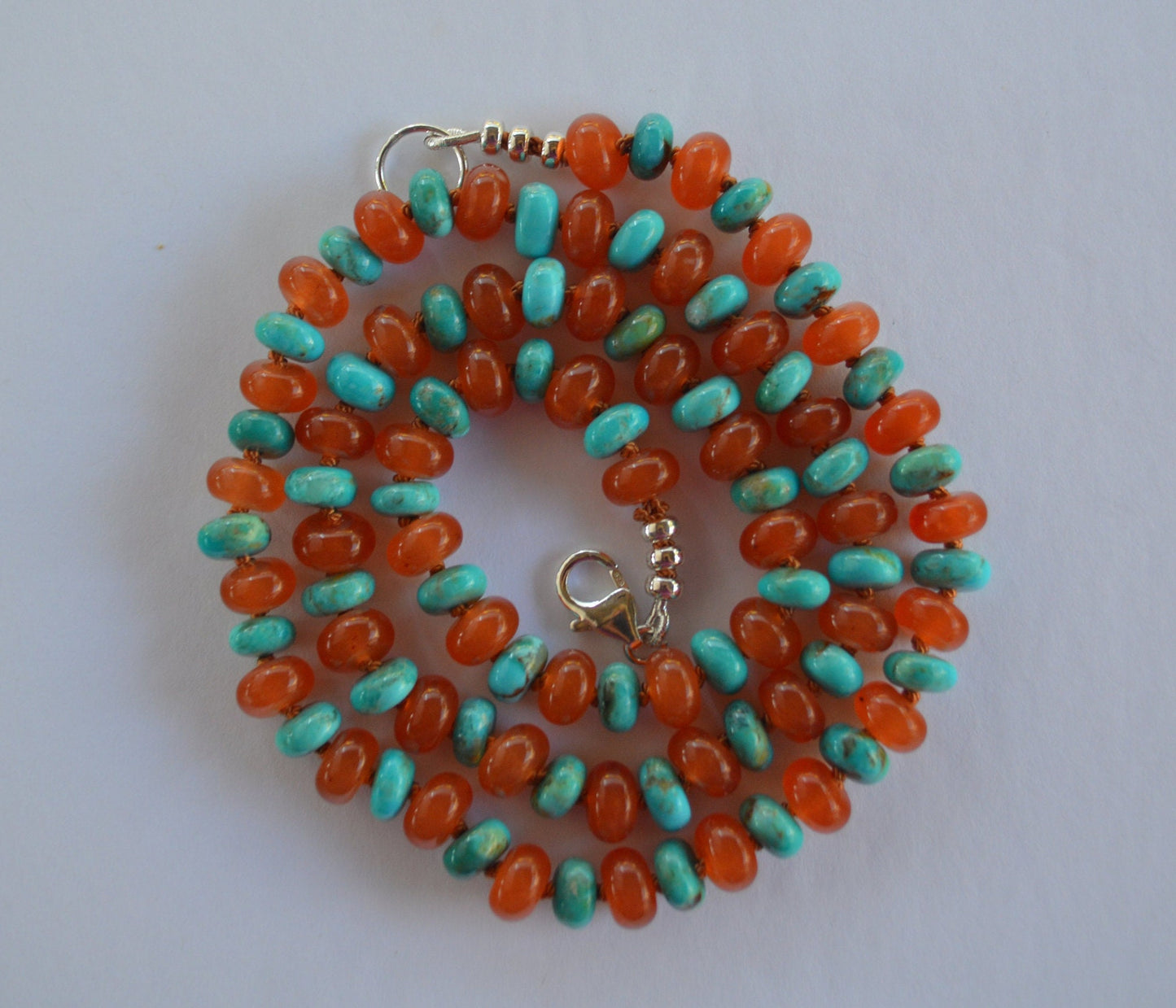 Kingman Turquoise and Carnelian Hand Knotted Necklace. Sterling Silver Clasp and Beads. 23"