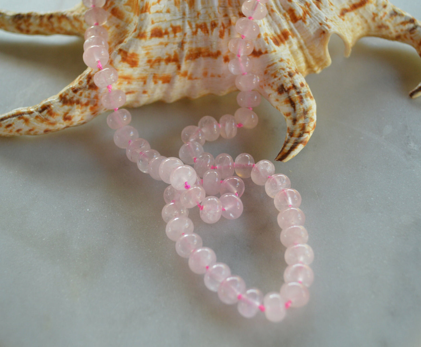 Rose Quartz Smooth Rondelle Gemstones Hand Knotted on Hot Pink or Fuchsia Silk.  18" of Quiet Beauty. Sterling Silver Clasp