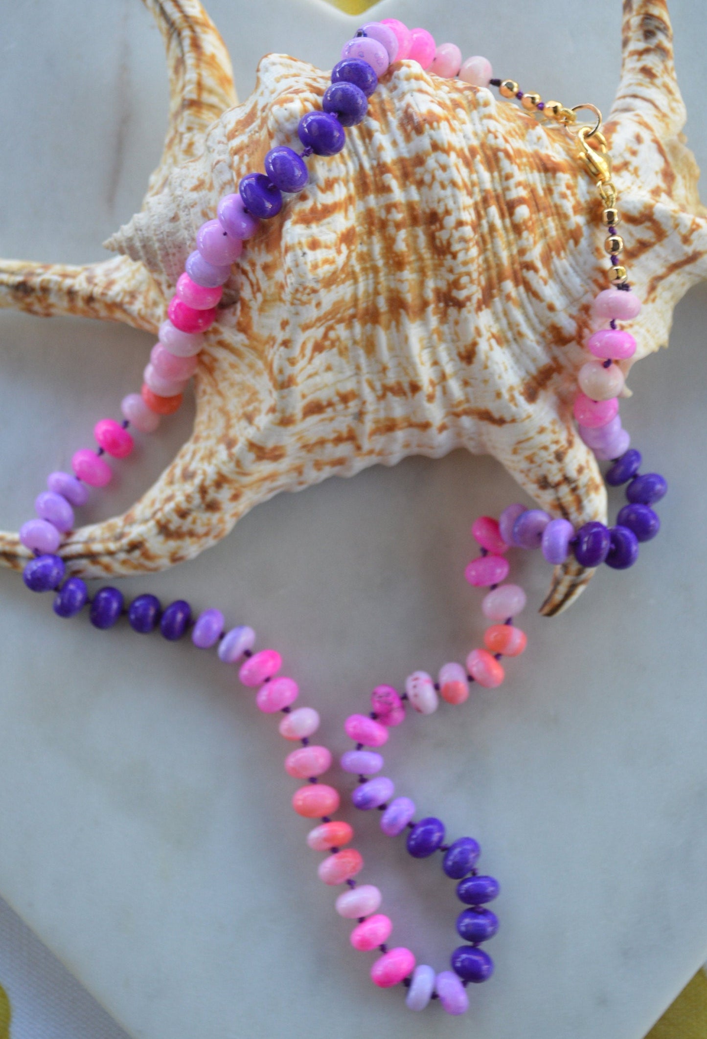 22" Pink and Purple Smooth Rondelle Opal Rondelle Beads Hand Knotted on Dark Amethyst Silk.  Comes with 3" Gold Filled Extender Chain