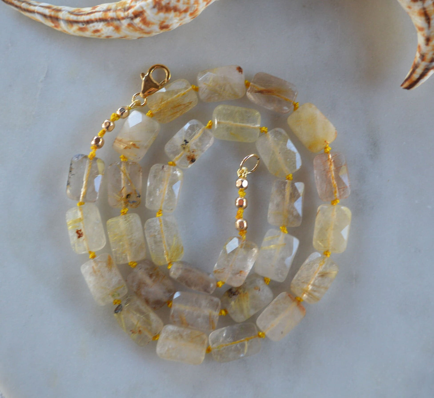 Golden Rutilated Quartz Faceted Cube Beads Hand Knotted on Yellow Silk.  18k Gold Filled Lobster Claw Clasp and Faceted Beads