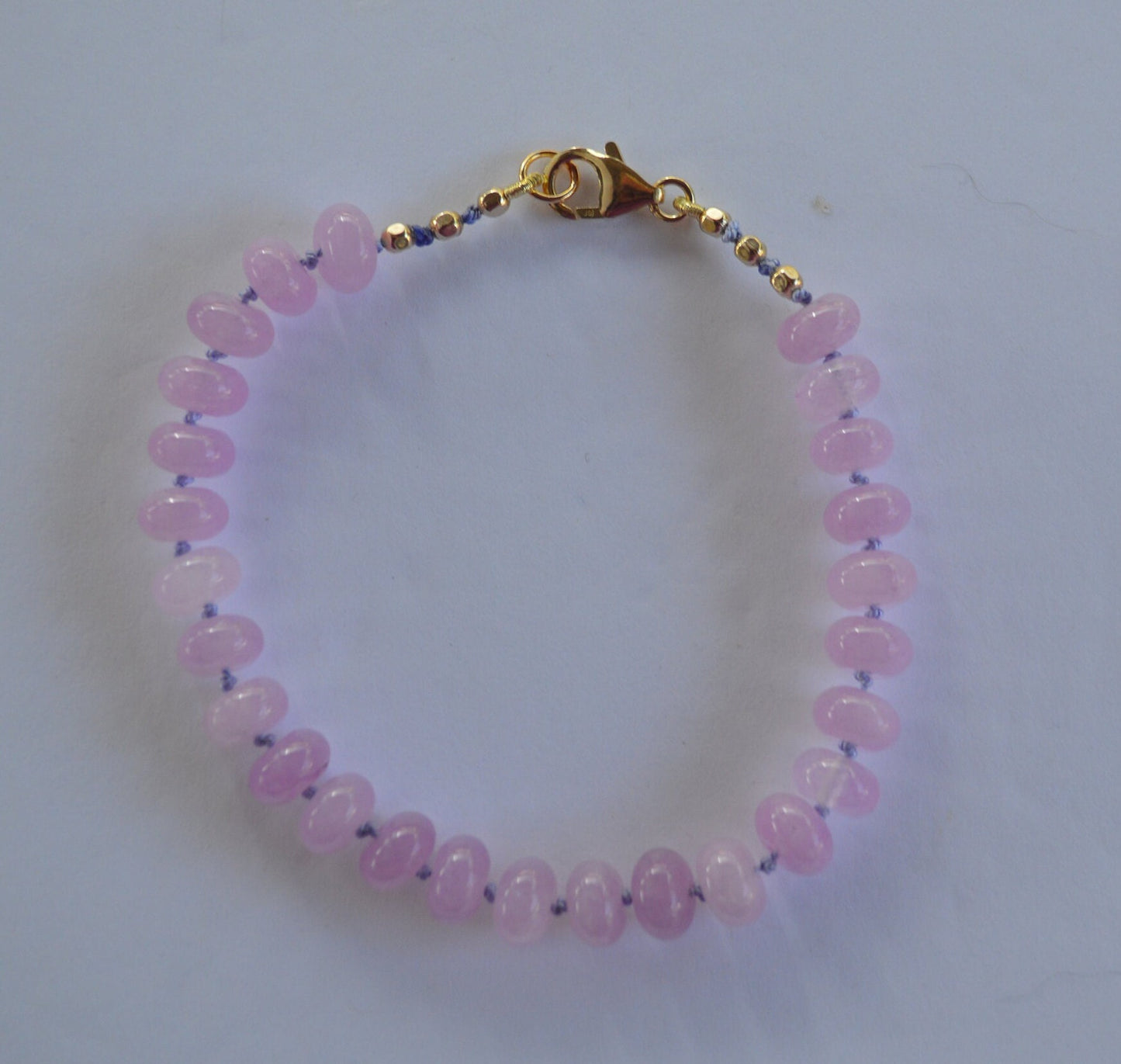 Lavender Quartz Rondelle Bracelet Hand Knotted on Lavender Silk.  7- 3/4". Gold Filled Lobster Claw Clasp and Faceted Beads