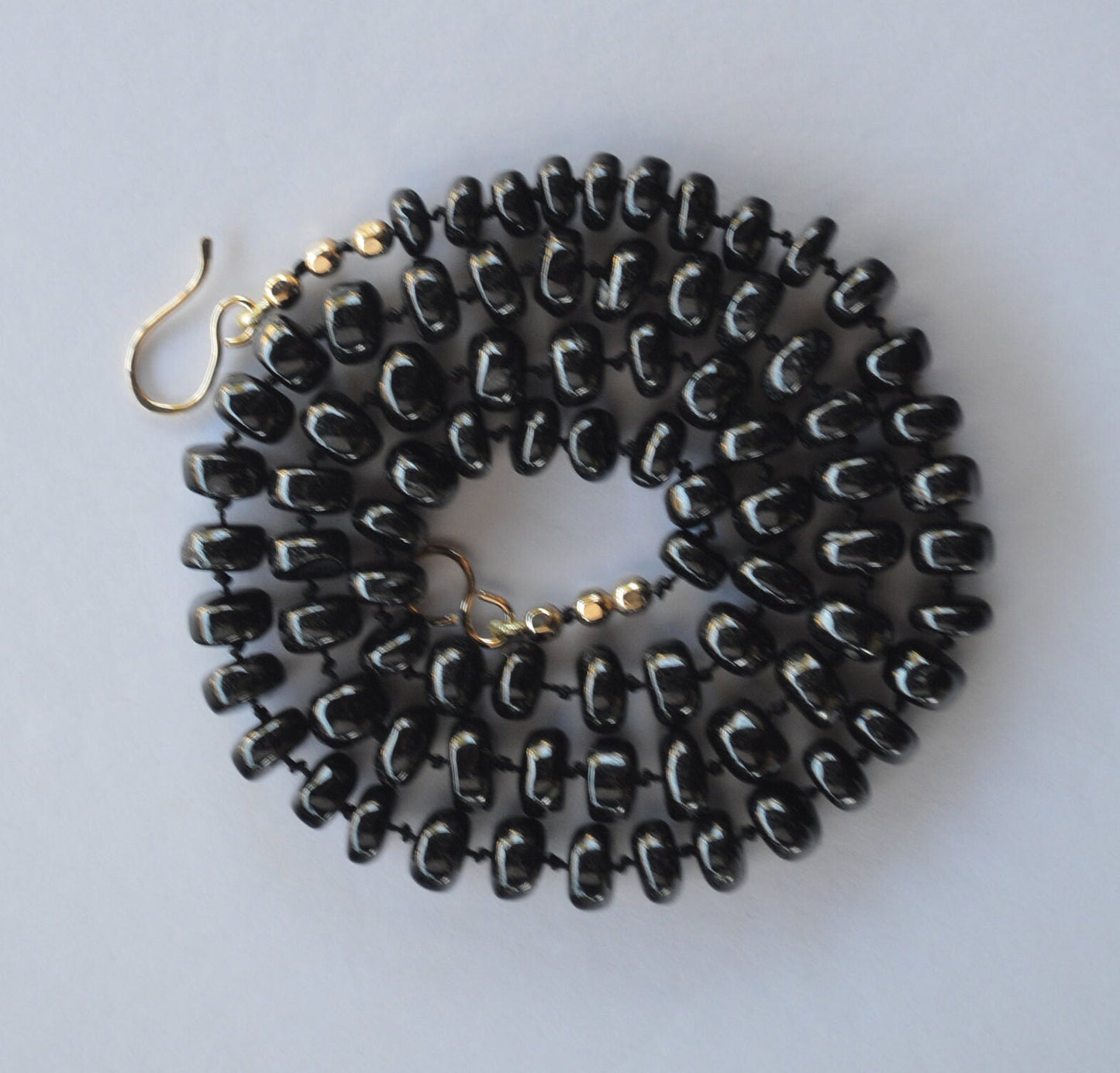 Black Spinel 8mm Smooth Rondelle Necklace Hand Knotted on Black Silk. 18k Gold Filled Hook and Eye Clasp and Beads.  Valentine's Day Sale