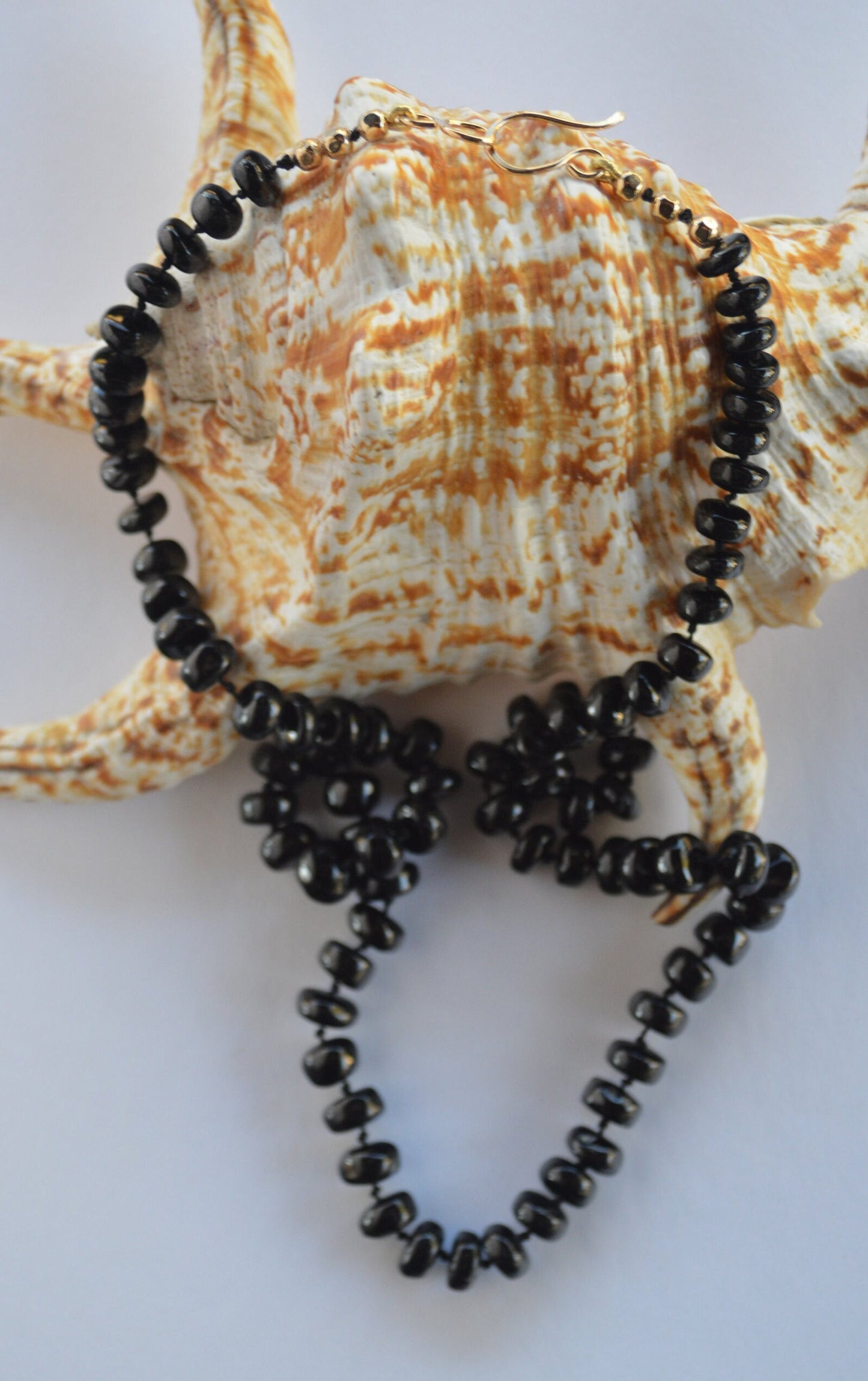 Black Spinel 8mm Smooth Rondelle Necklace Hand Knotted on Black Silk. 18k Gold Filled Hook and Eye Clasp and Beads.  Valentine's Day Sale
