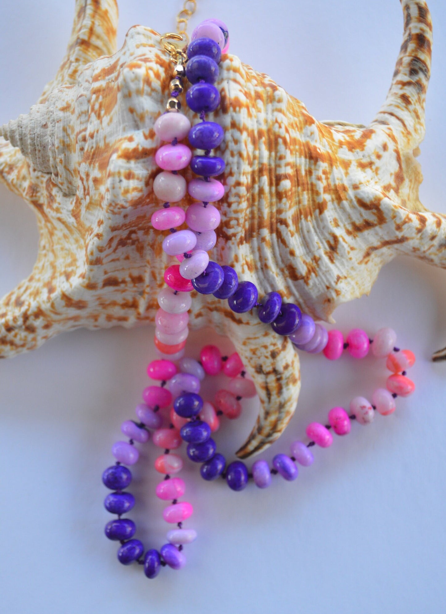 22" Pink and Purple Smooth Rondelle Opal Rondelle Beads Hand Knotted on Dark Amethyst Silk.  Comes with 3" Gold Filled Extender Chain