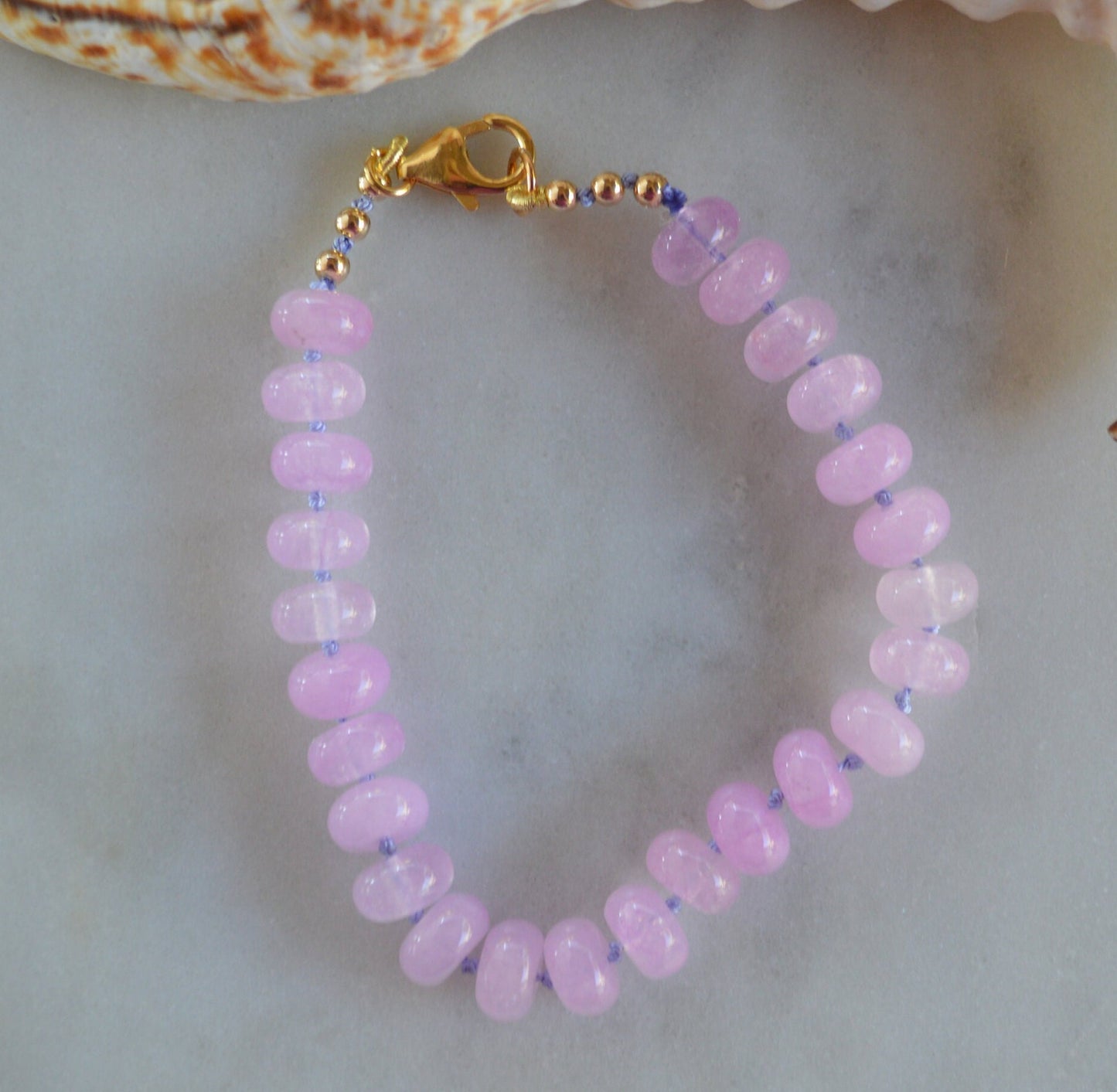 Lavender Quartz Rondelle Bracelet Hand Knotted on Lavender Silk.  7- 3/4". Gold Filled Lobster Claw Clasp and Faceted Beads