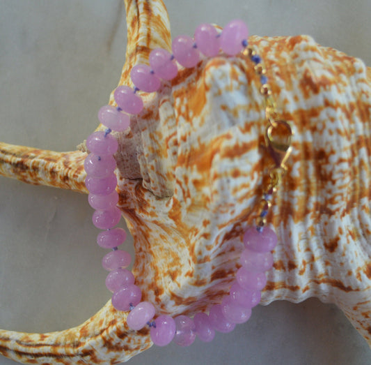 Lavender Quartz Rondelle Bracelet Hand Knotted on Lavender Silk.  7- 3/4". Gold Filled Lobster Claw Clasp and Faceted Beads