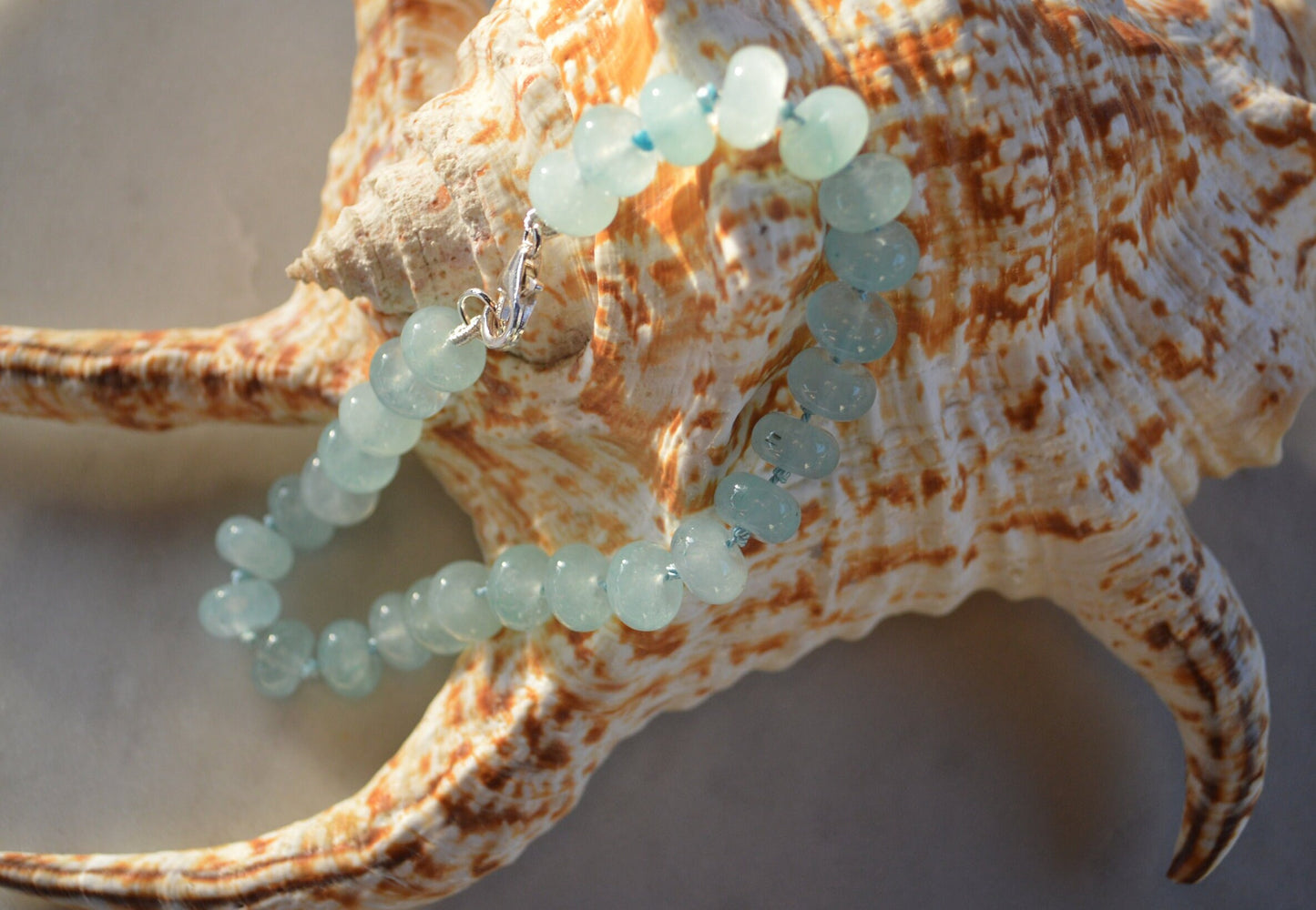 Natural Aqua Blue Chalcedony Bracelet Hand Knotted on Turquoise Silk. Sterling Lobster Clasp. 7 1/2" --8" Length. 8mm Beads