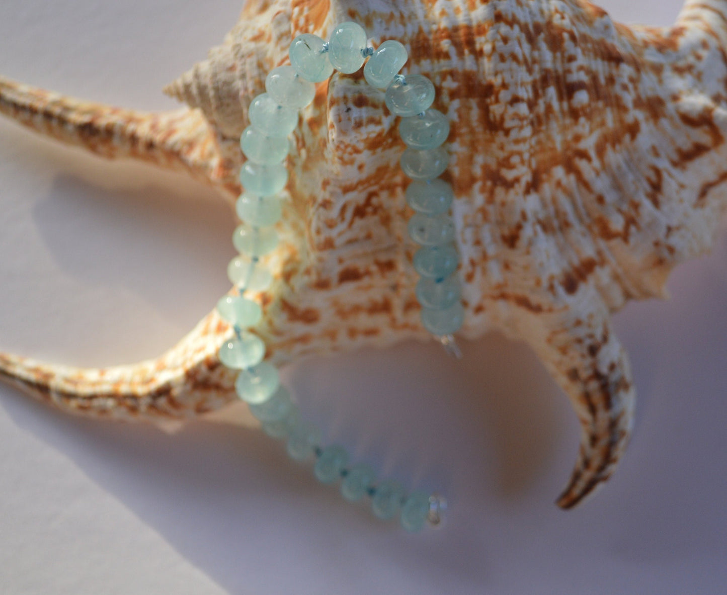 Natural Aqua Blue Chalcedony Bracelet Hand Knotted on Turquoise Silk. Sterling Lobster Clasp. 7 1/2" --8" Length. 8mm Beads
