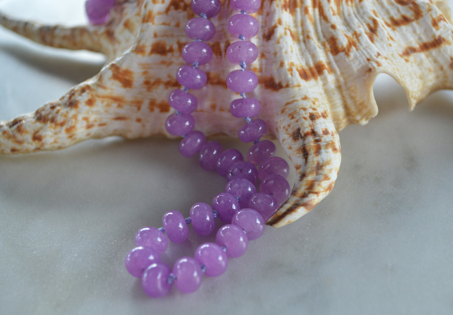 Lavender Quartz Rondell Necklace Hand Knotted on Lilac Silk.  Sterling Silver Lobster Clasp. Choose 18", 20" or 21" at Checkout