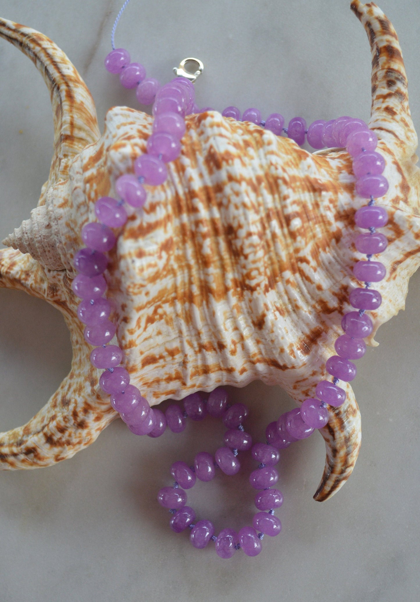 Lavender Quartz Rondell Necklace Hand Knotted on Lilac Silk.  Sterling Silver Lobster Clasp. Choose 18", 20" or 21" at Checkout