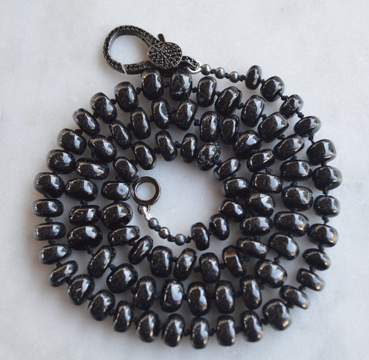 23" Black Spinel Smooth Rondelle Gemstones Hand Knotted On Black Silk. Black CZ Lobster Clasp Can Be Worn in Back or Front With Charms