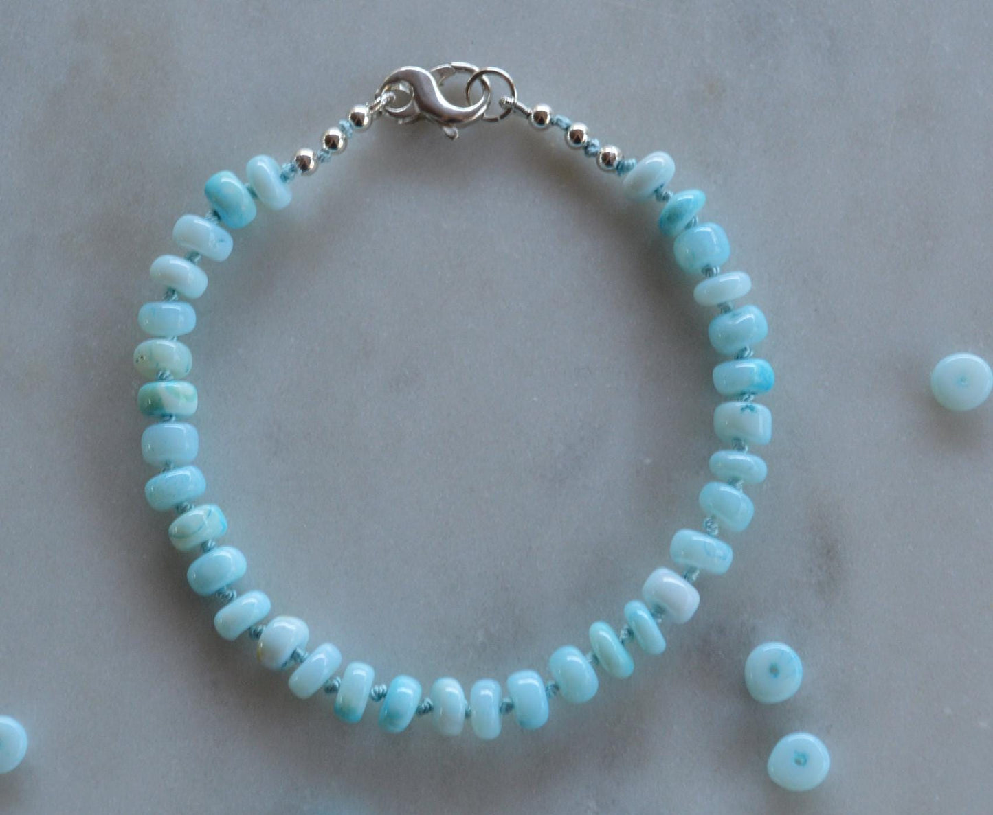 Sky Blue Opal Rondelle Knotted Bracelet.  Sterling Lobster Clasp. Turquoise Silk.  Summer Vibes