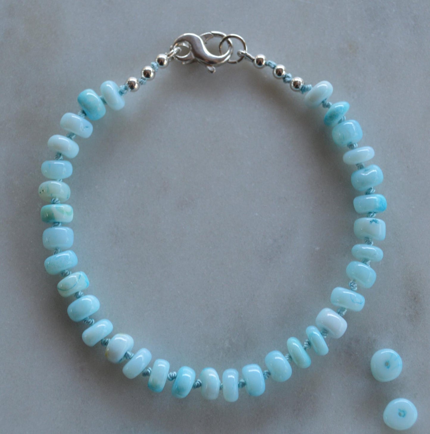 Sky Blue Opal Rondelle Knotted Bracelet.  Sterling Lobster Clasp. Turquoise Silk.  Summer Vibes