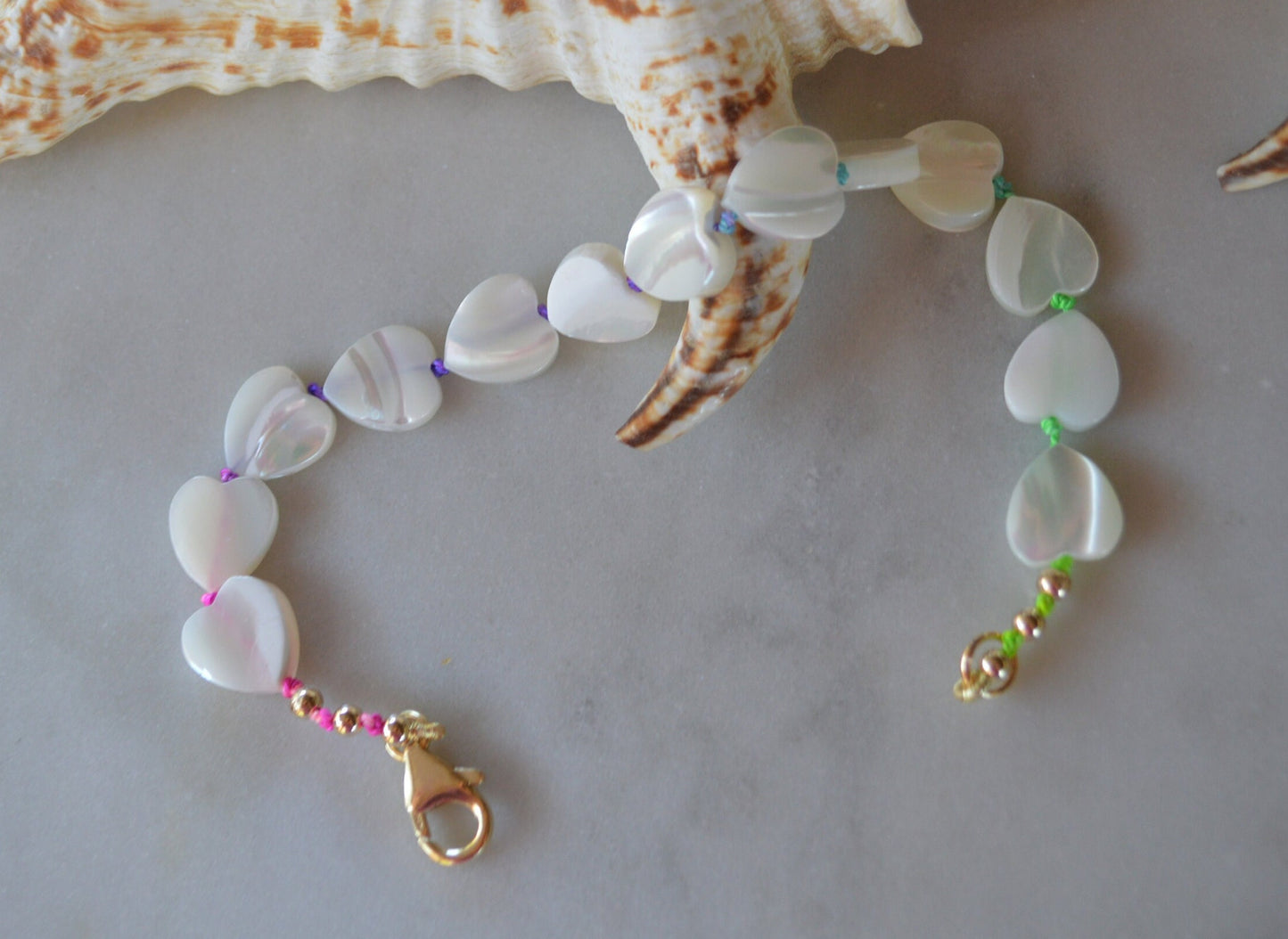 Beautiful Mother of Pearl Heart Bead Bracelet Hand Knotted on Multicolored Silk Thread.  Gold Filled Lobster Claw and Beads. 8 or 10 mm.