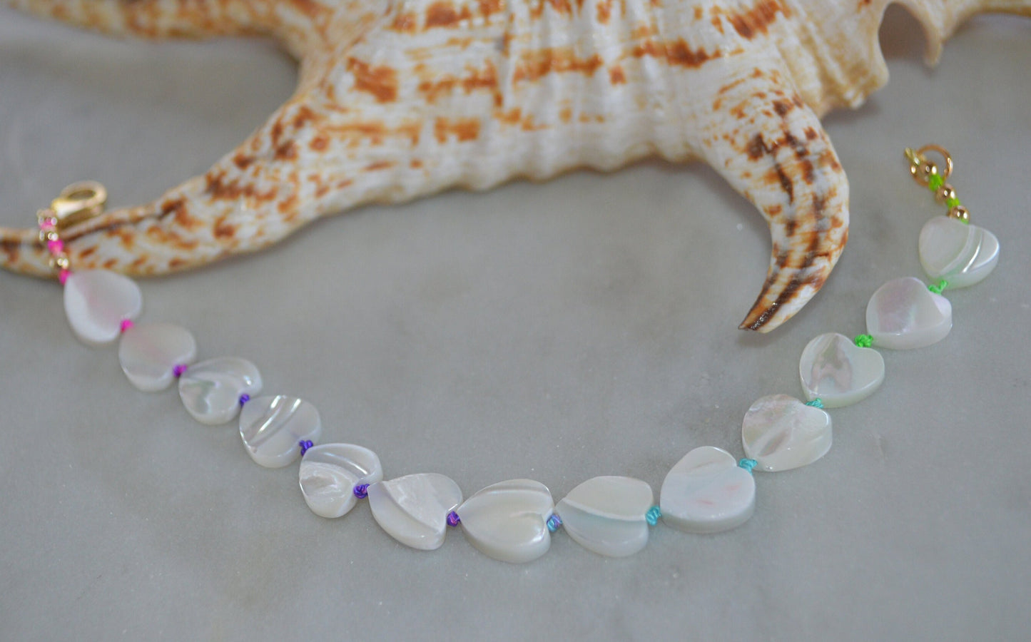 Beautiful Mother of Pearl Heart Bead Bracelet Hand Knotted on Multicolored Silk Thread.  Gold Filled Lobster Claw and Beads. 8 or 10 mm.