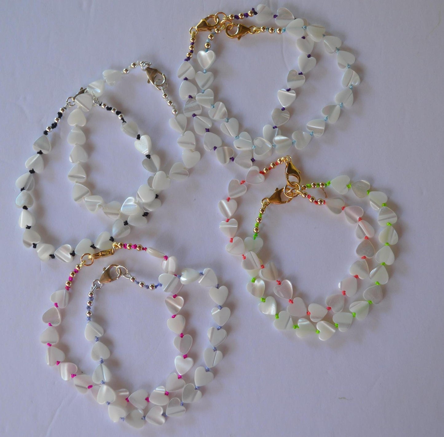 Iridescent 8mm Mother of Pearl Hearts Hand Knotted Bracelets on Various Silk Threads. GF or Sterling Silver Lobster Clasp   7.5"