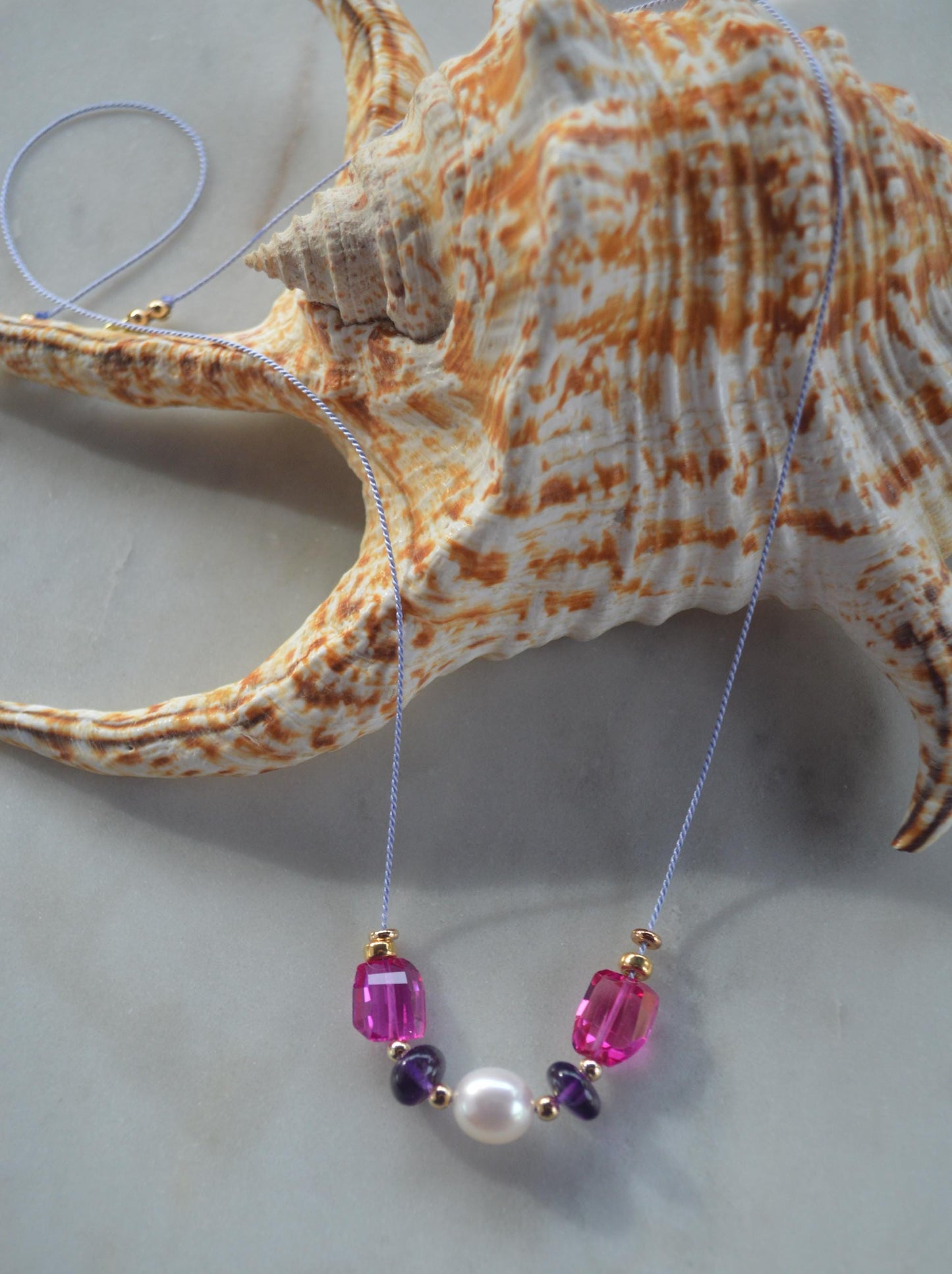20" AAA Edison Pearl, Pink Spinel Nuggets and Amethyst Rondelles Floating on Lavender Silk.  Gold Filled Lobster Clasp. Very Special Piece