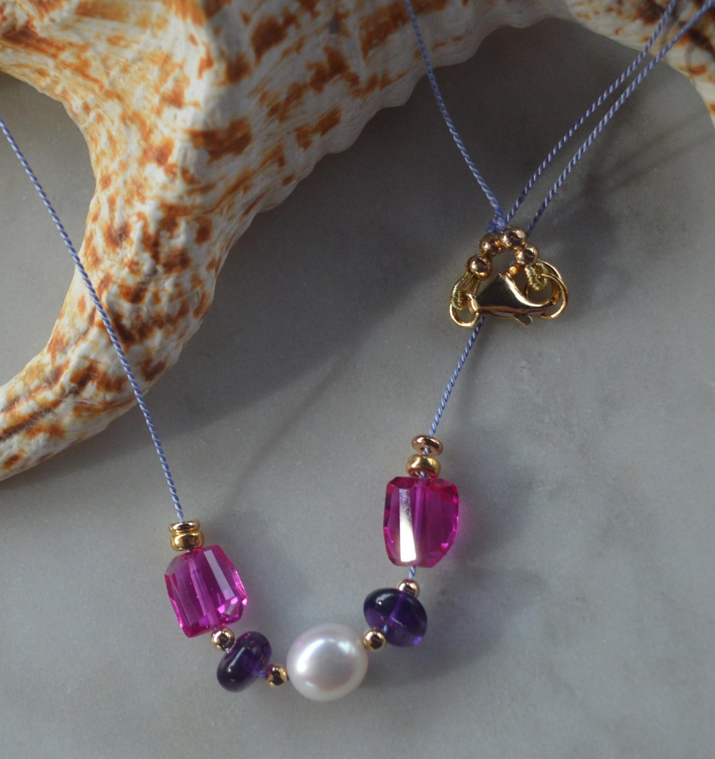 20" AAA Edison Pearl, Pink Spinel Nuggets and Amethyst Rondelles Floating on Lavender Silk.  Gold Filled Lobster Clasp. Very Special Piece