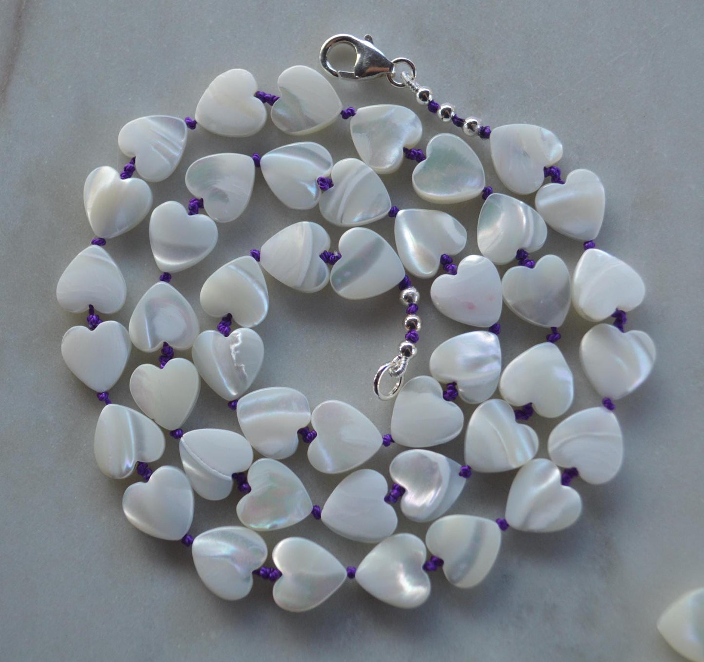 Heart to Heart! 18" or 22" Necklace of Mother of Pearl Heart Shaped Beads Hand Knotted on Amethyst Silk. Sterling Italian Lobster Clasp.