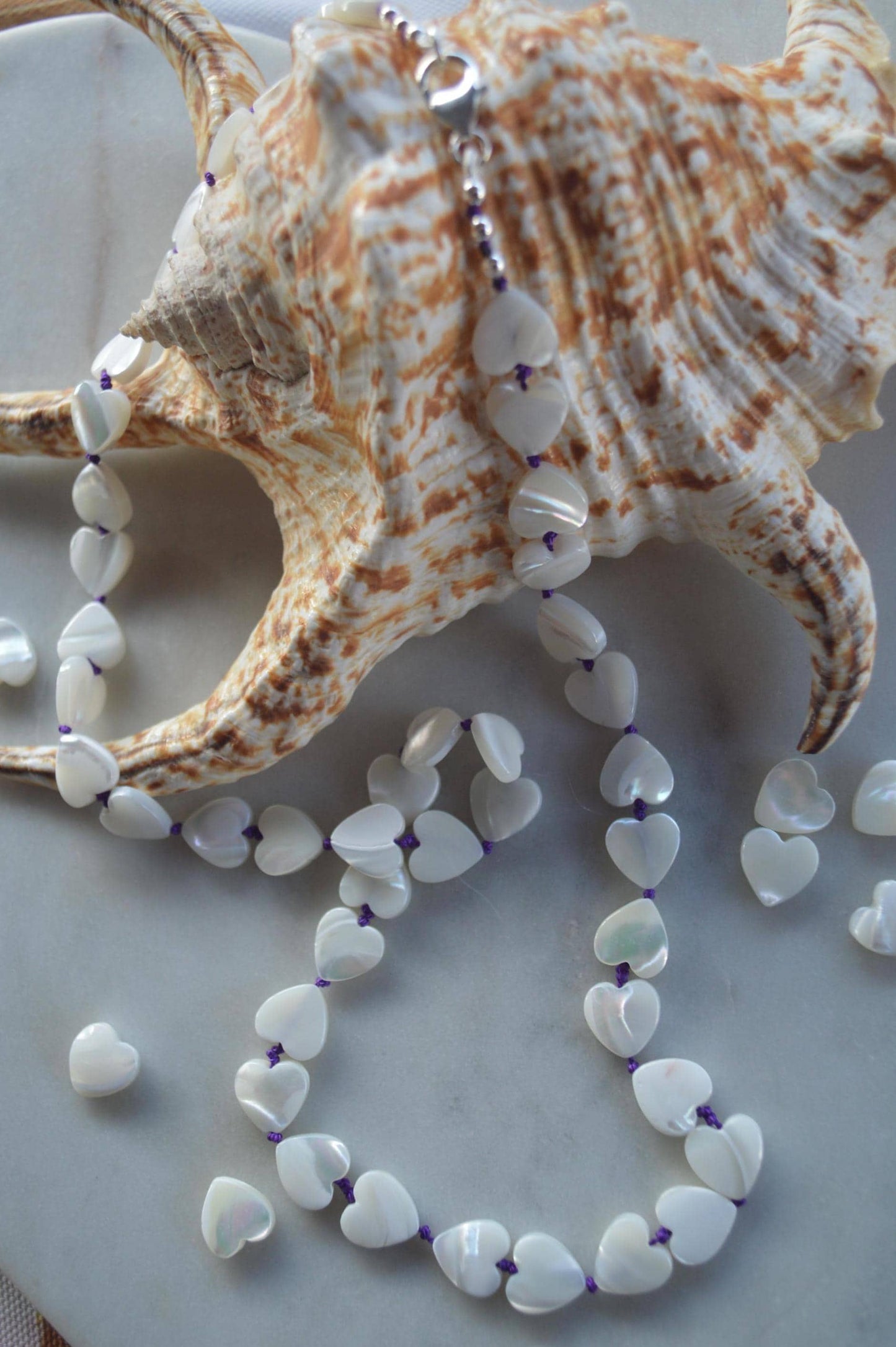 Heart to Heart! 18" or 22" Necklace of Mother of Pearl Heart Shaped Beads Hand Knotted on Amethyst Silk. Sterling Italian Lobster Clasp.