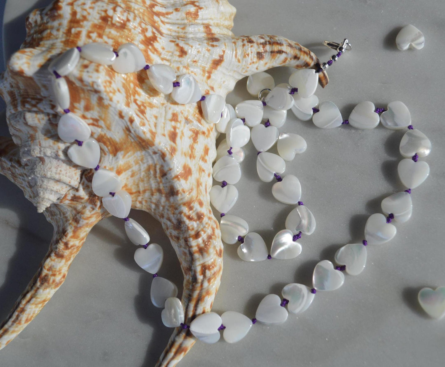 Heart to Heart! 18" or 22" Necklace of Mother of Pearl Heart Shaped Beads Hand Knotted on Amethyst Silk. Sterling Italian Lobster Clasp.