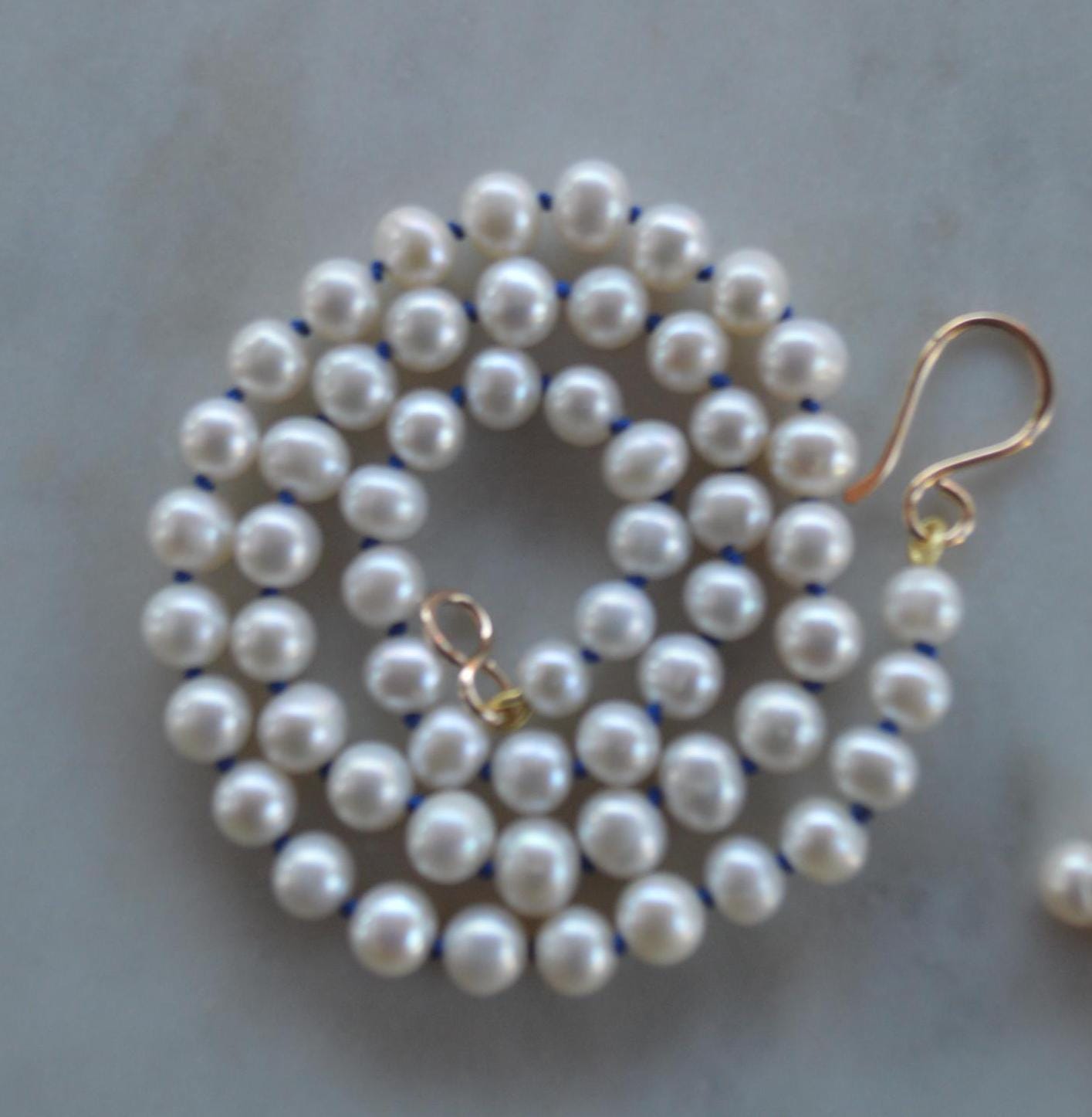 AA Pearls Hand Knotted on Sapphire Blue Silk. 20" With Hand Forged Gold-Filled Hook and Ey Clasp