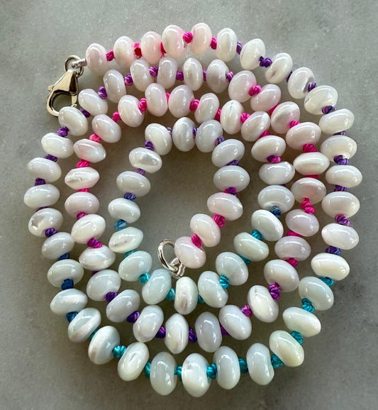 19" Mother of Pearl Rondelles Hand Knotted on Custom Fushia, Teal and Purple Silk. Sterling Lobster Clasp and Beads