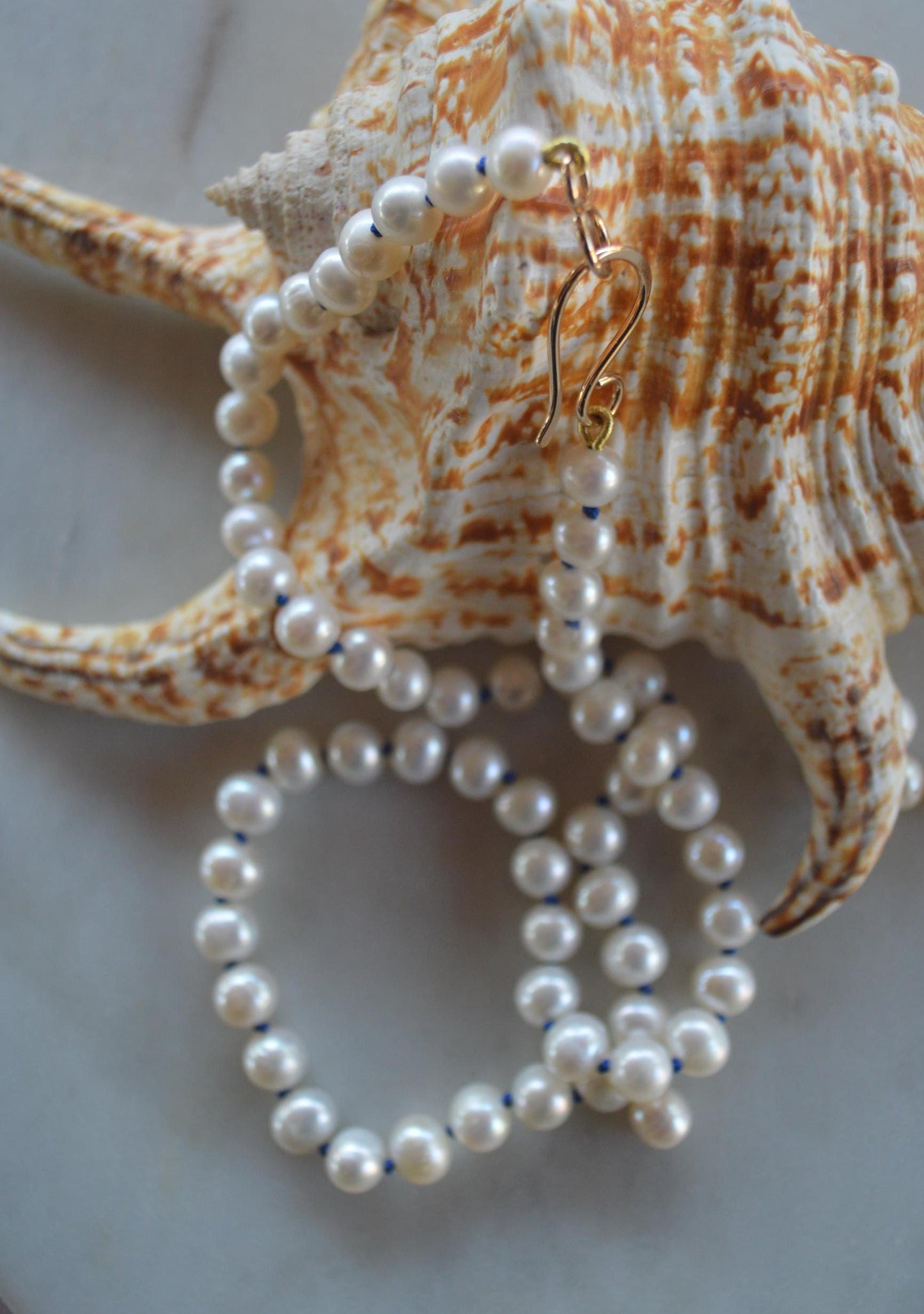 AA Pearls Hand Knotted on Sapphire Blue Silk. 20" With Hand Forged Gold-Filled Hook and Ey Clasp