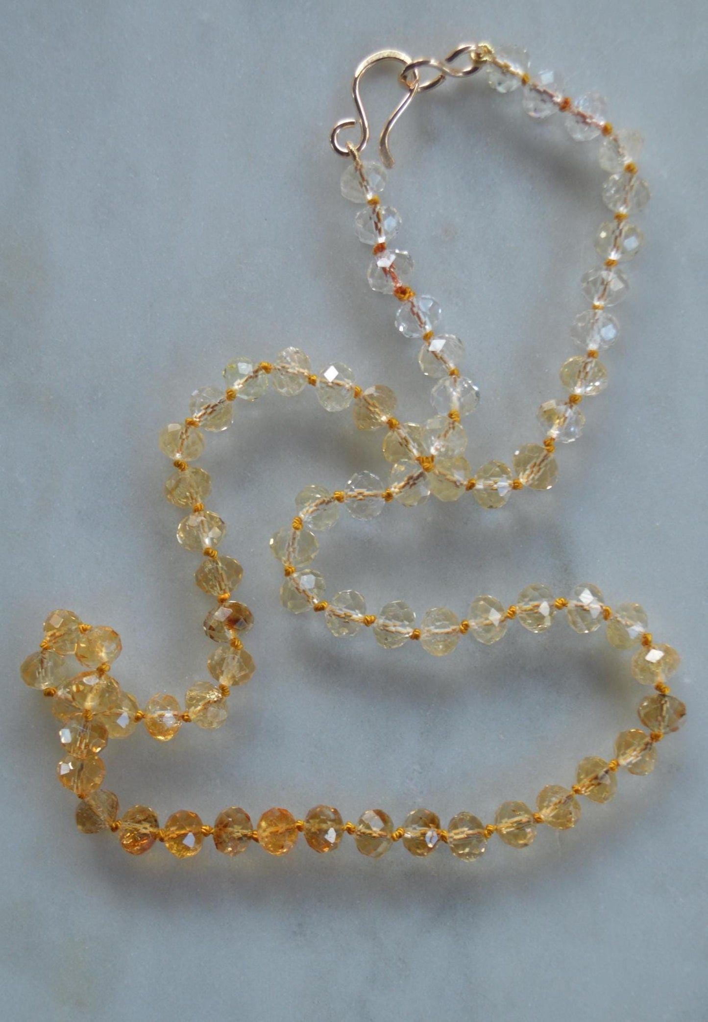 Sparkly High Grade 7mm Faceted Citrine Gemstones Hand Knotted on Gold Silk.  Hand Forged Gold-Filled Hook and Eye Clasp