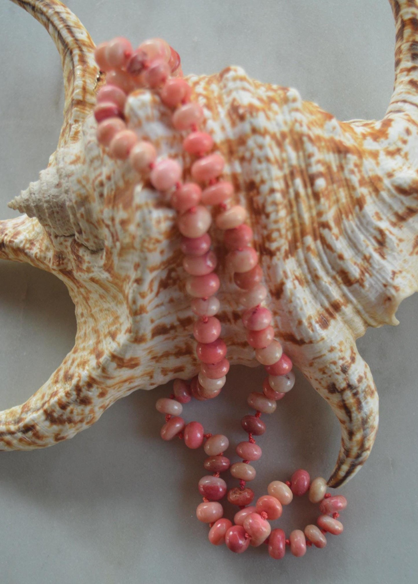 18" Orange and Coral Smooth Rondelle Necklace Hand Knotted on Custom Silk. Gold Filled Lobster Clasp and Beads.