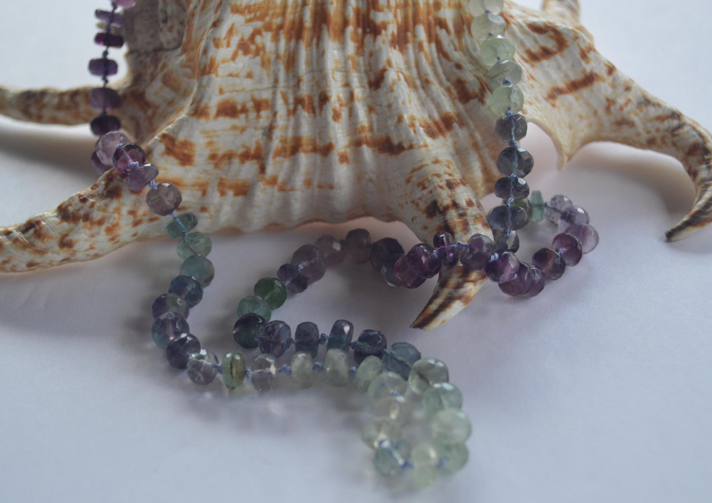Beautiful 21" Flourite  Faceted Rondelle Necklace Hand Knotted on Lavender Silk. Sterling Silver Hand Forged Hook and Eye Clasp