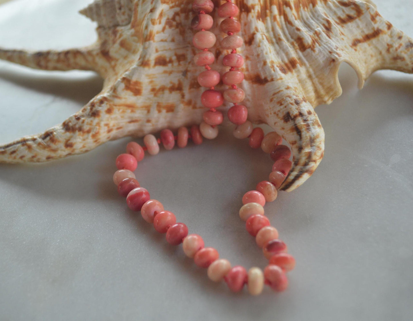 18" Orange and Coral Smooth Rondelle Necklace Hand Knotted on Custom Silk. Gold Filled Lobster Clasp and Beads.