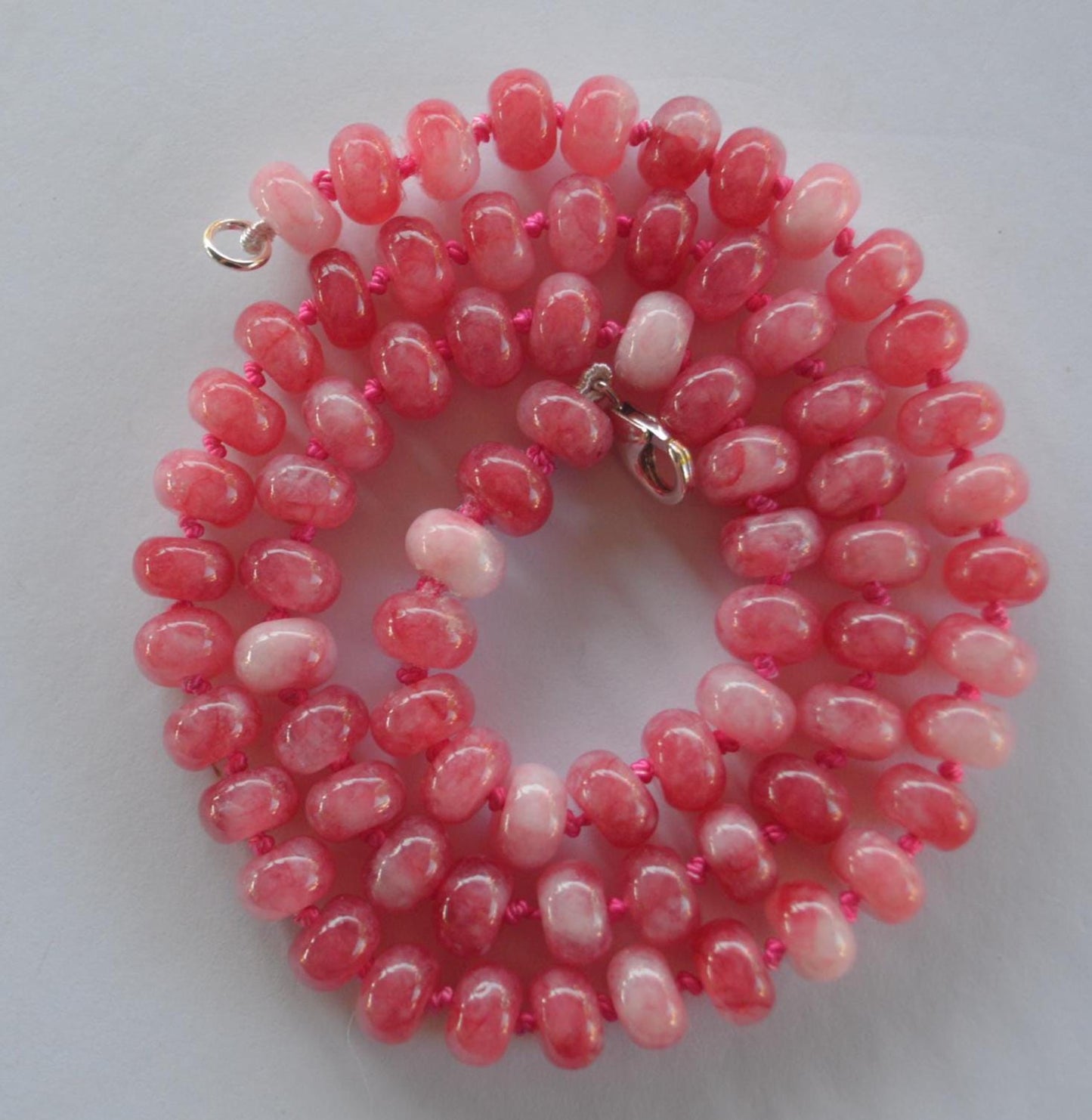 Grapefruit Quartz Smooth Rondelle Gemstones Hand Knotted on Custom Grapefruit Colored Silk. Sterling Lobster Clasp