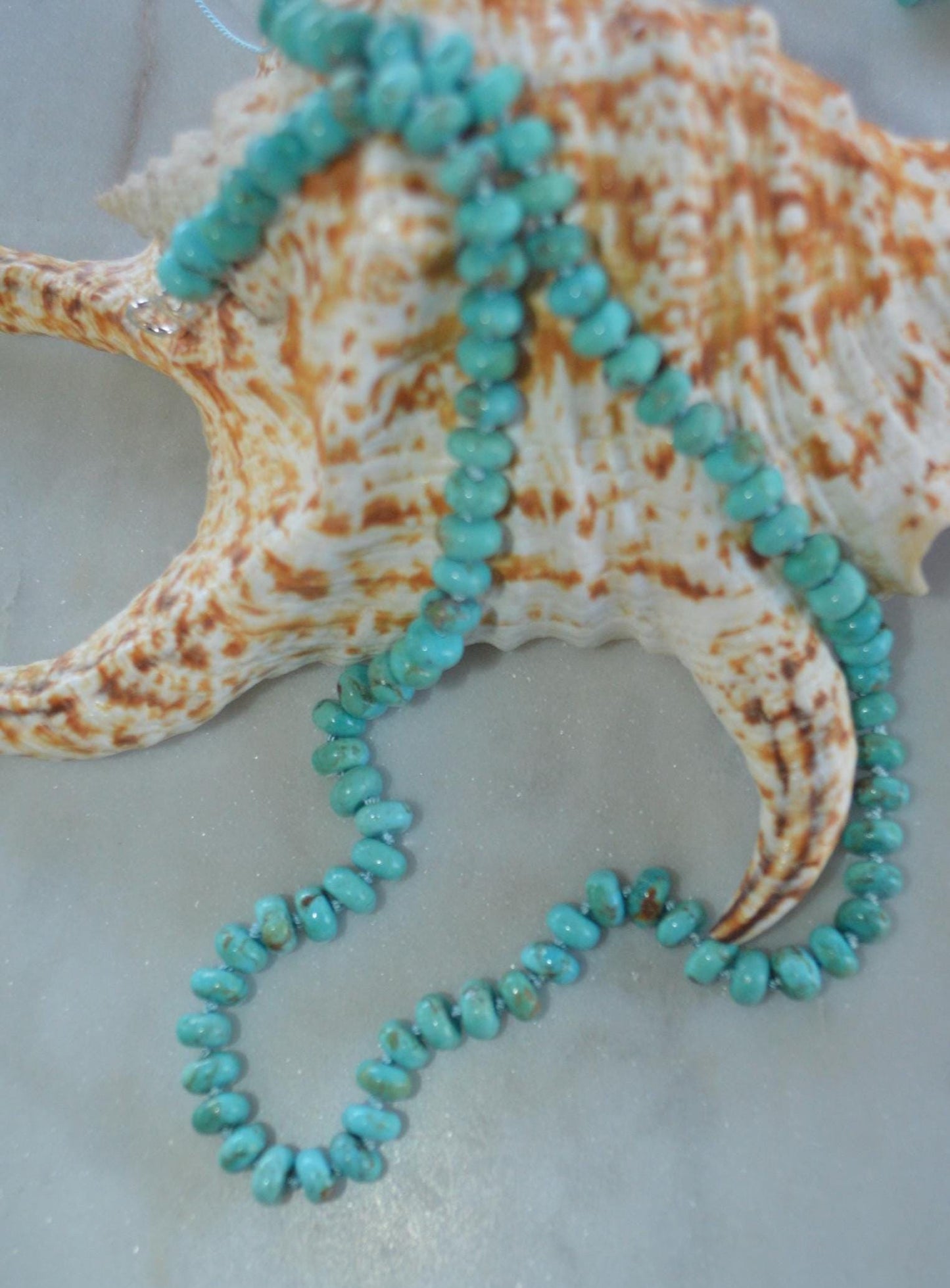 Kingman Turquoise Hand Knotted Necklace on Silk Thread.  7-8mm Smooth Rondelle Beads. Hand Forged Sterling Silver Hook and Eye Clasp. 19-21"