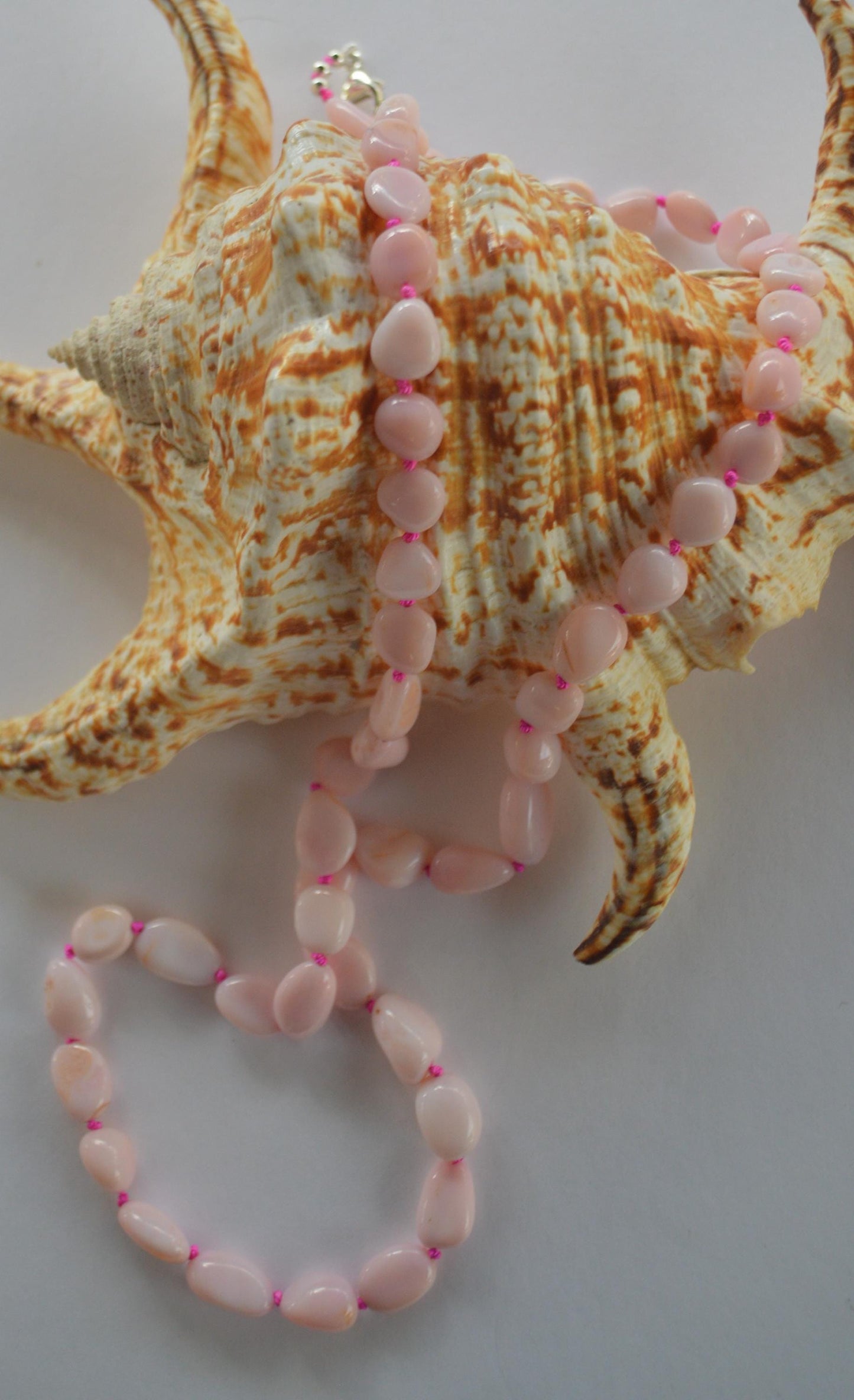 Pink Opal Smooth Nuggets Hand Knotted on Custom Fuchsia Silk and Finished with a Sterling Silver Lobster Clasp