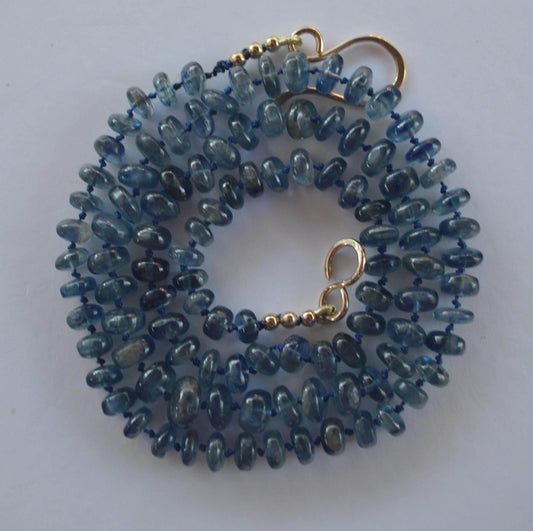 Moss Aquamarine Smooth Rondelle Gemstone Necklace Hand Knotted on Dark Blue Silk.  27.5"