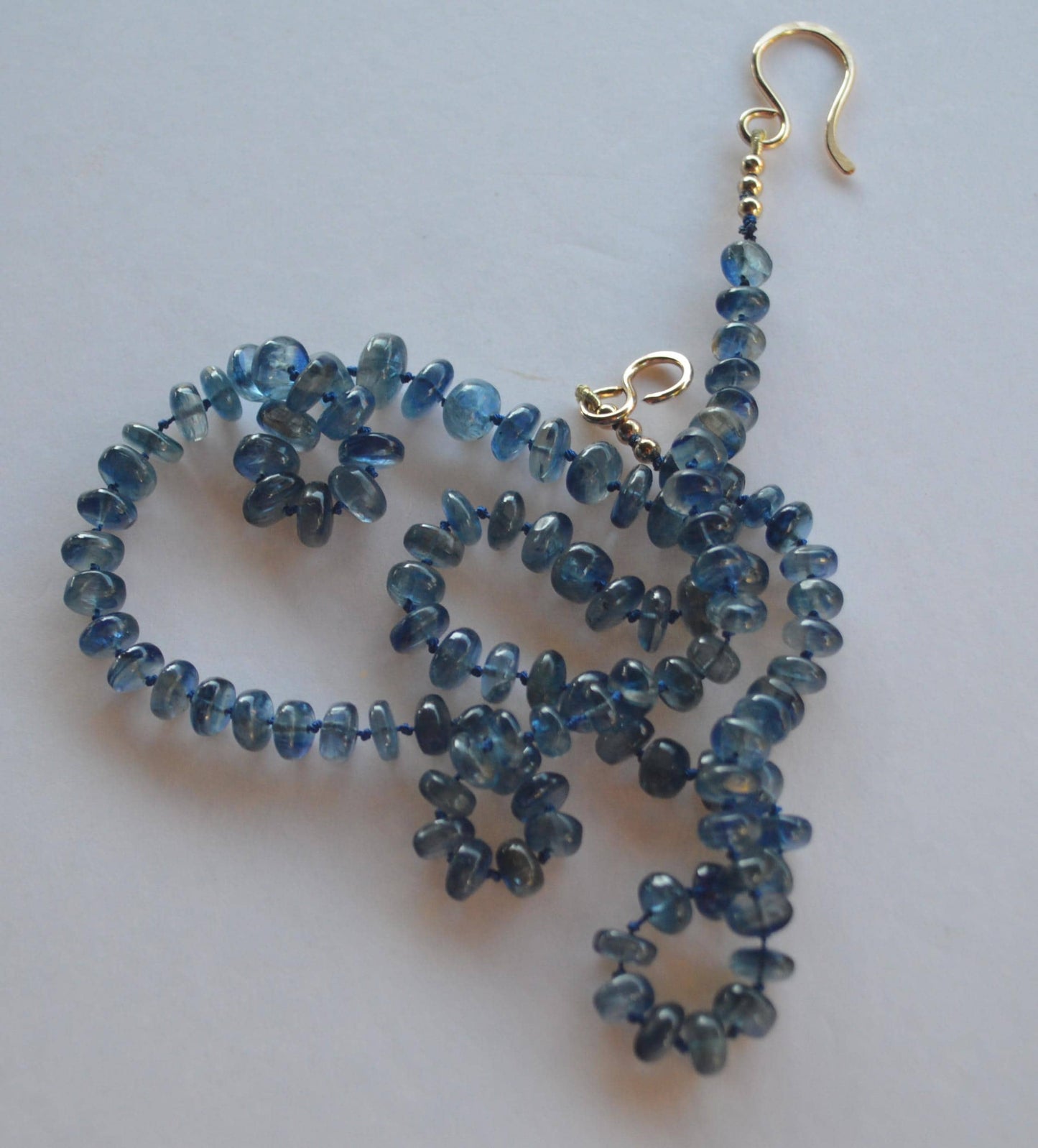Moss Aquamarine Smooth Rondelle Gemstone Necklace Hand Knotted on Dark Blue Silk.  27.5"