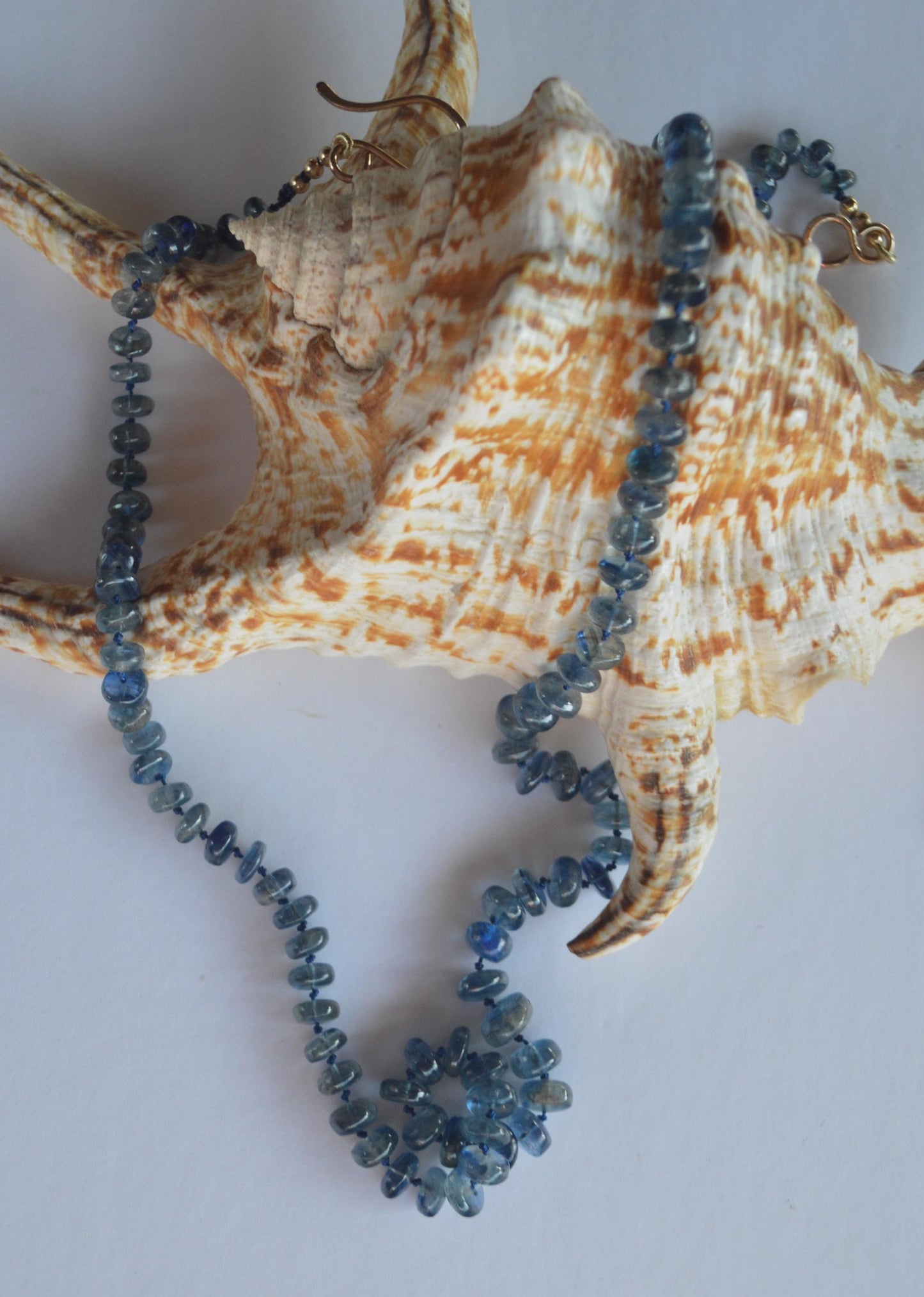 Moss Aquamarine Smooth Rondelle Gemstone Necklace Hand Knotted on Dark Blue Silk.  27.5"